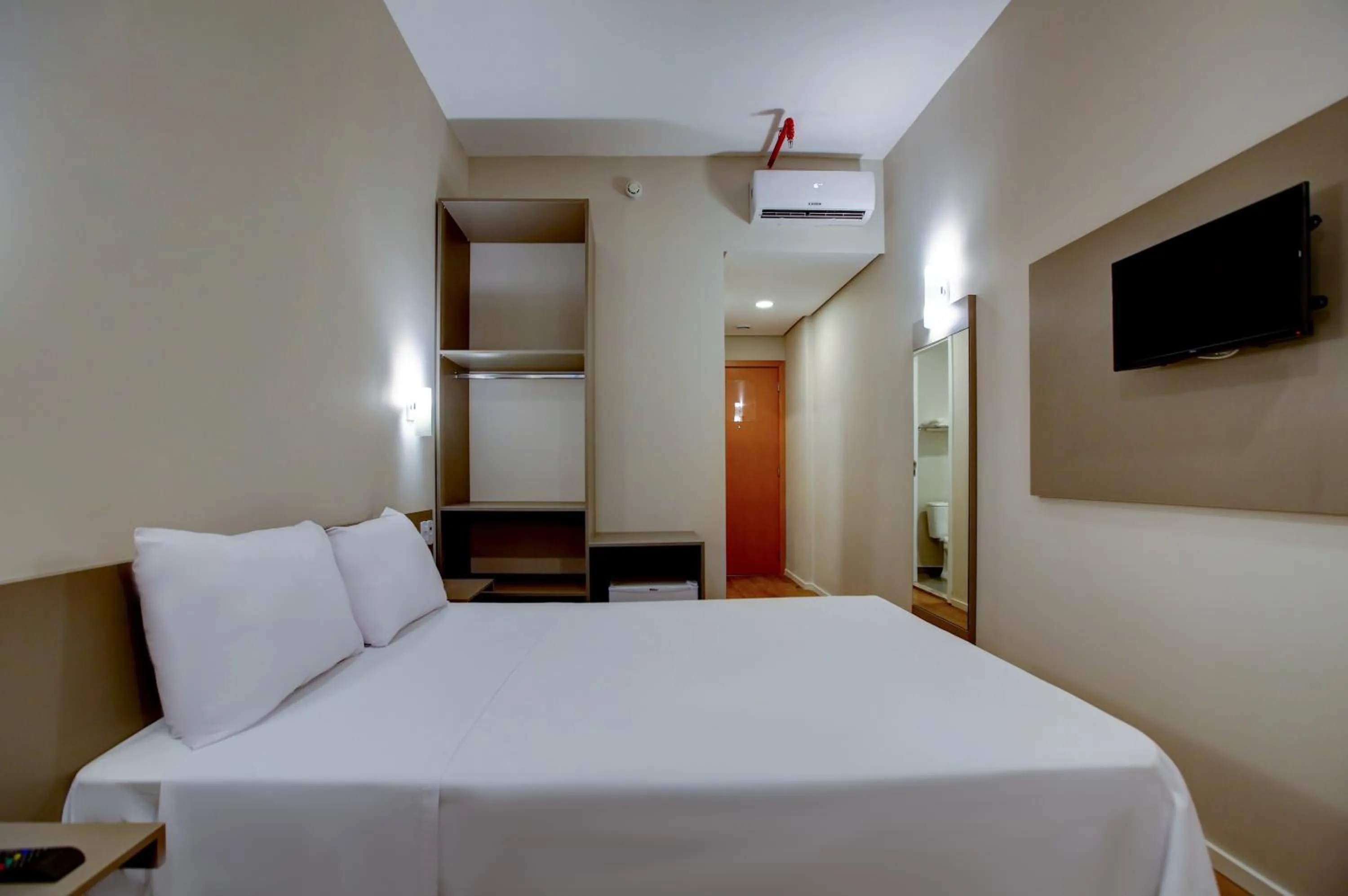 Photo of the whole room, Bed in Transamerica Fit Rondonopolis