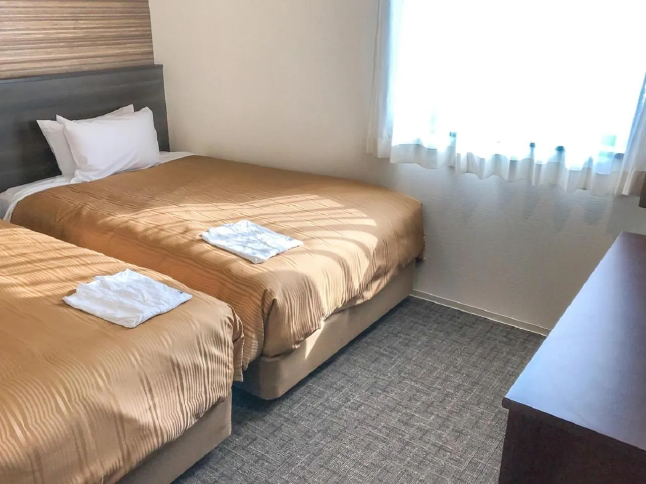 Bed in HOTEL LiVEMAX Sendai Kokubuncho