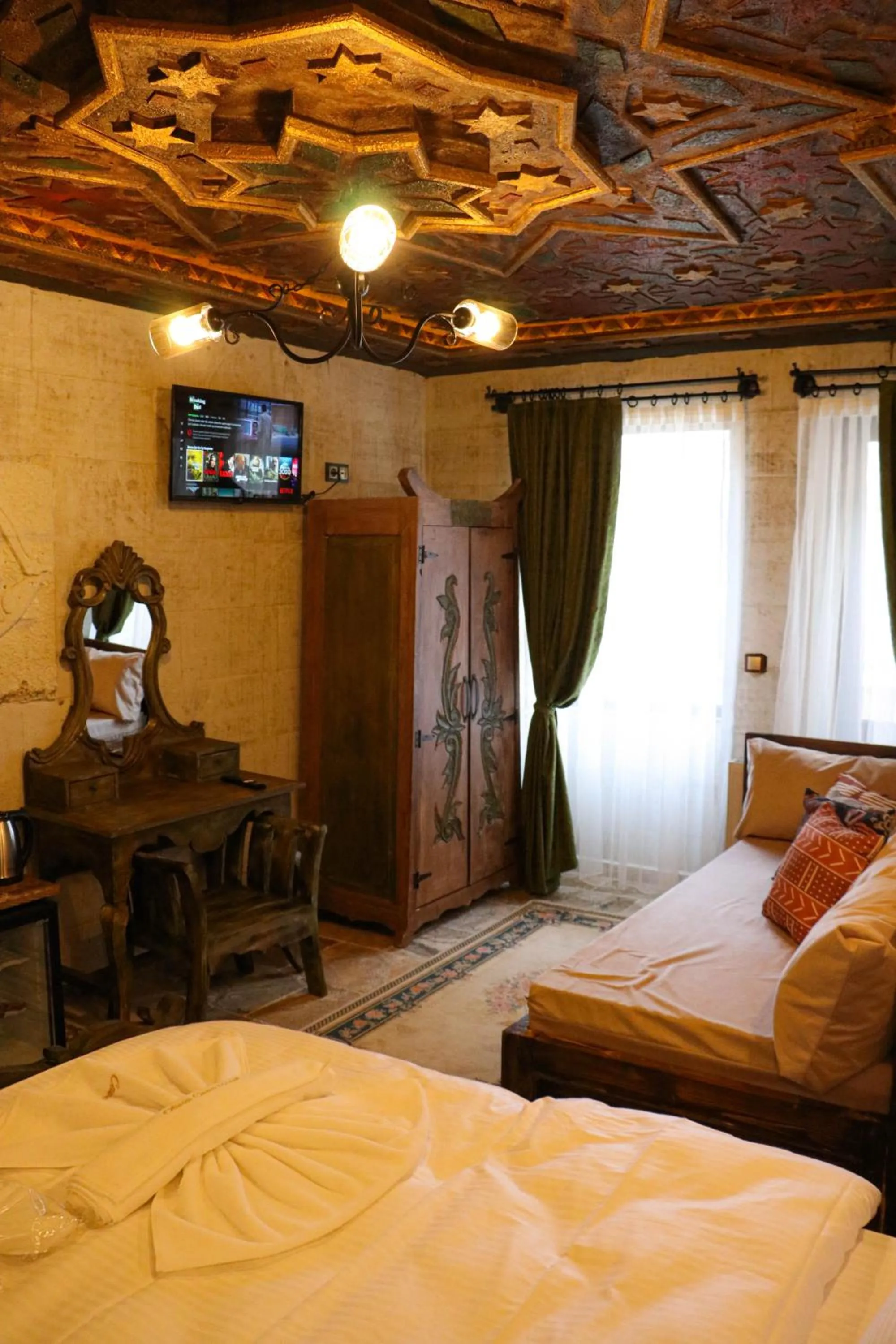 TV and multimedia, Bed in Olivia Cave Hotel