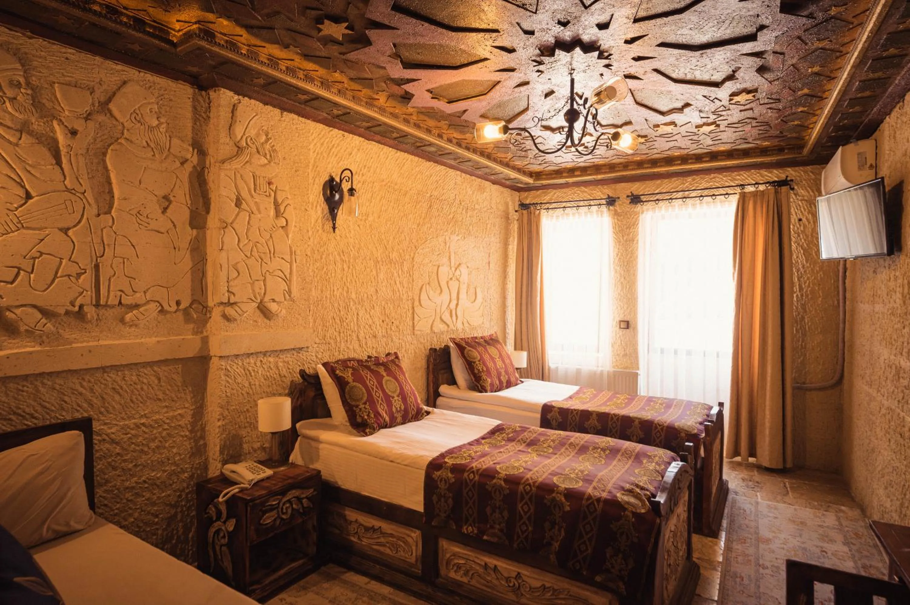 Bed in Olivia Cave Hotel