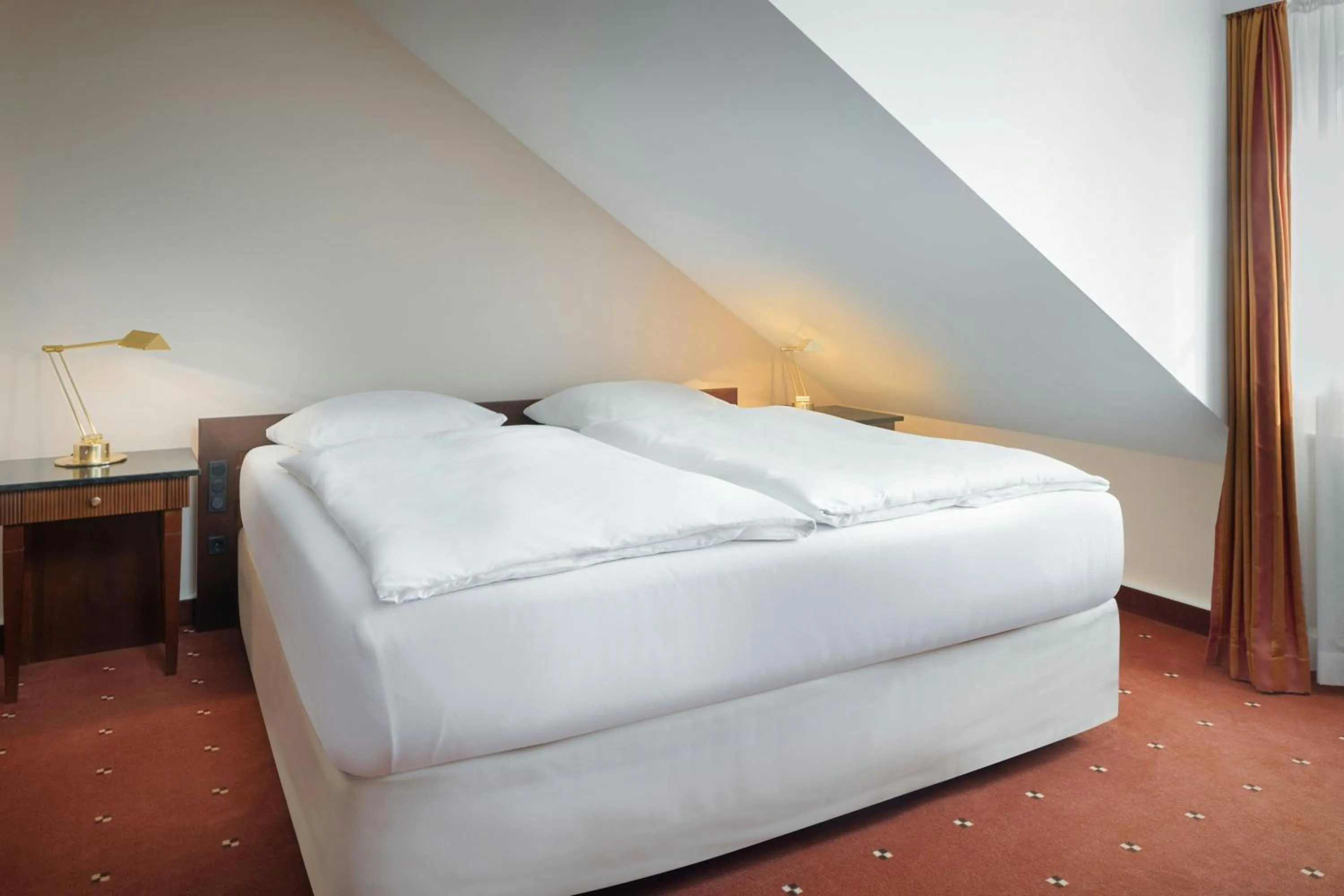 Photo of the whole room, Bed in Arabella Jagdhof Resort am Fuschlsee, a Tribute Portfolio Hotel