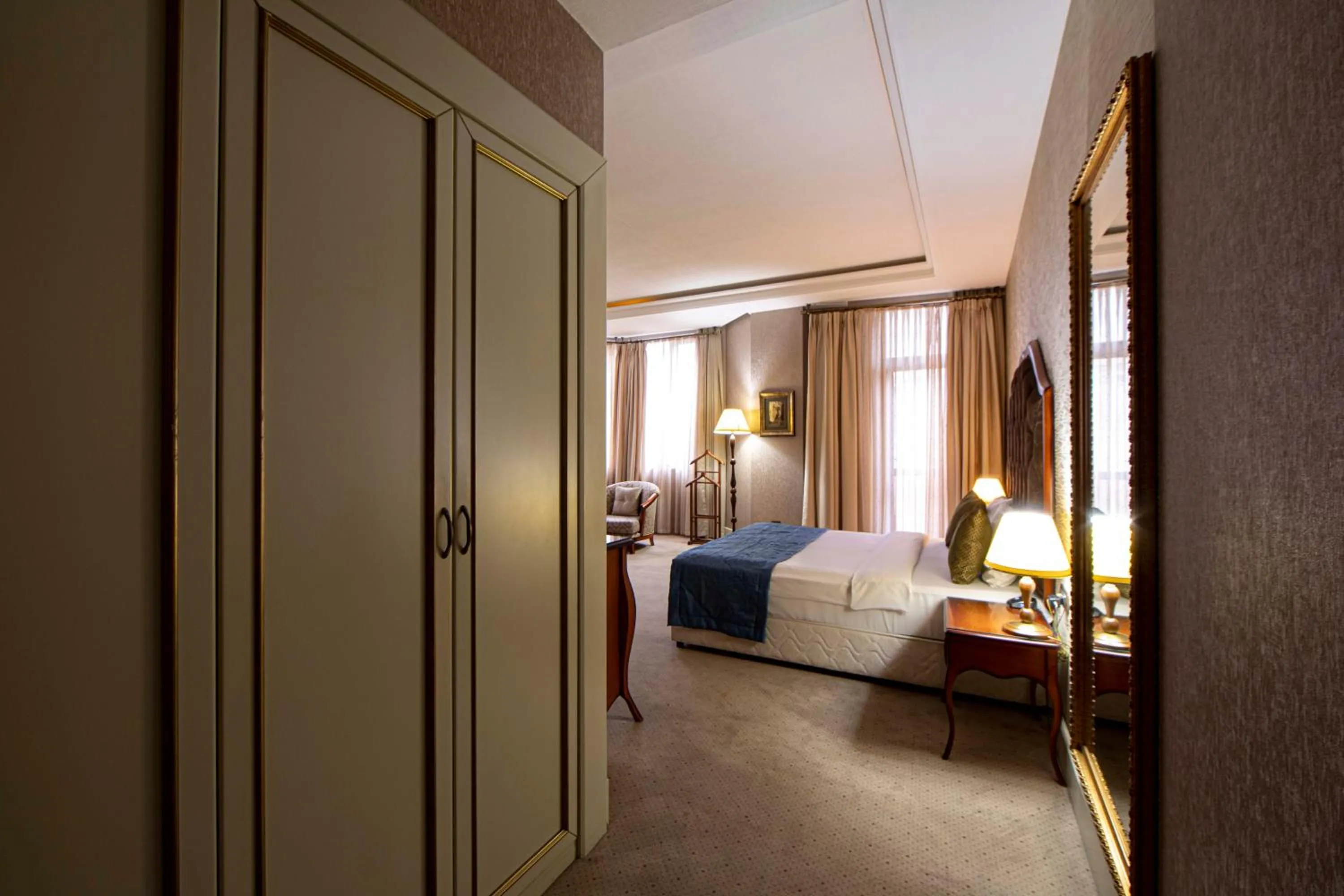 Bed in Sapphire Inn Hotel