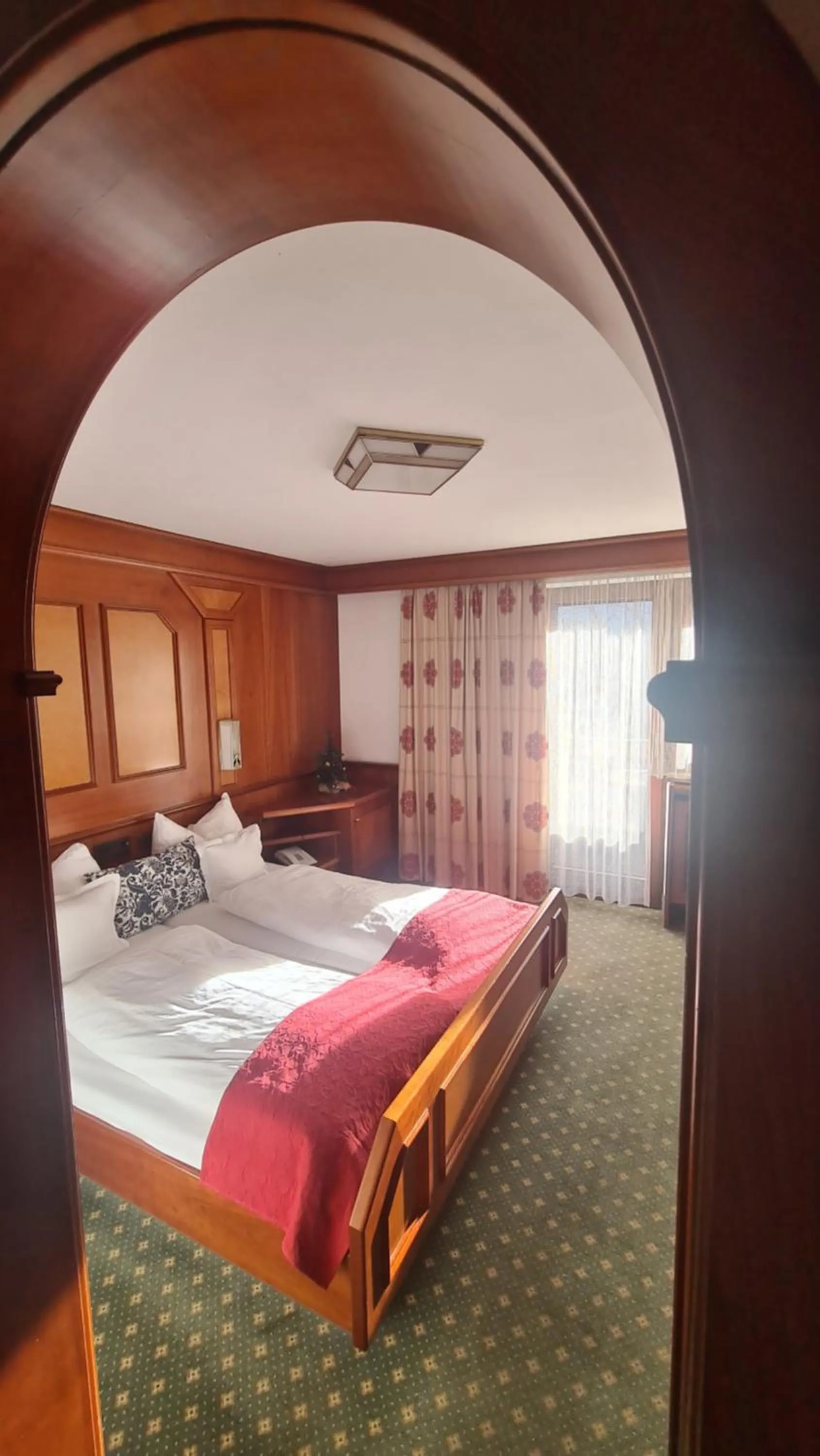 Bed in Hotel Tyrolis