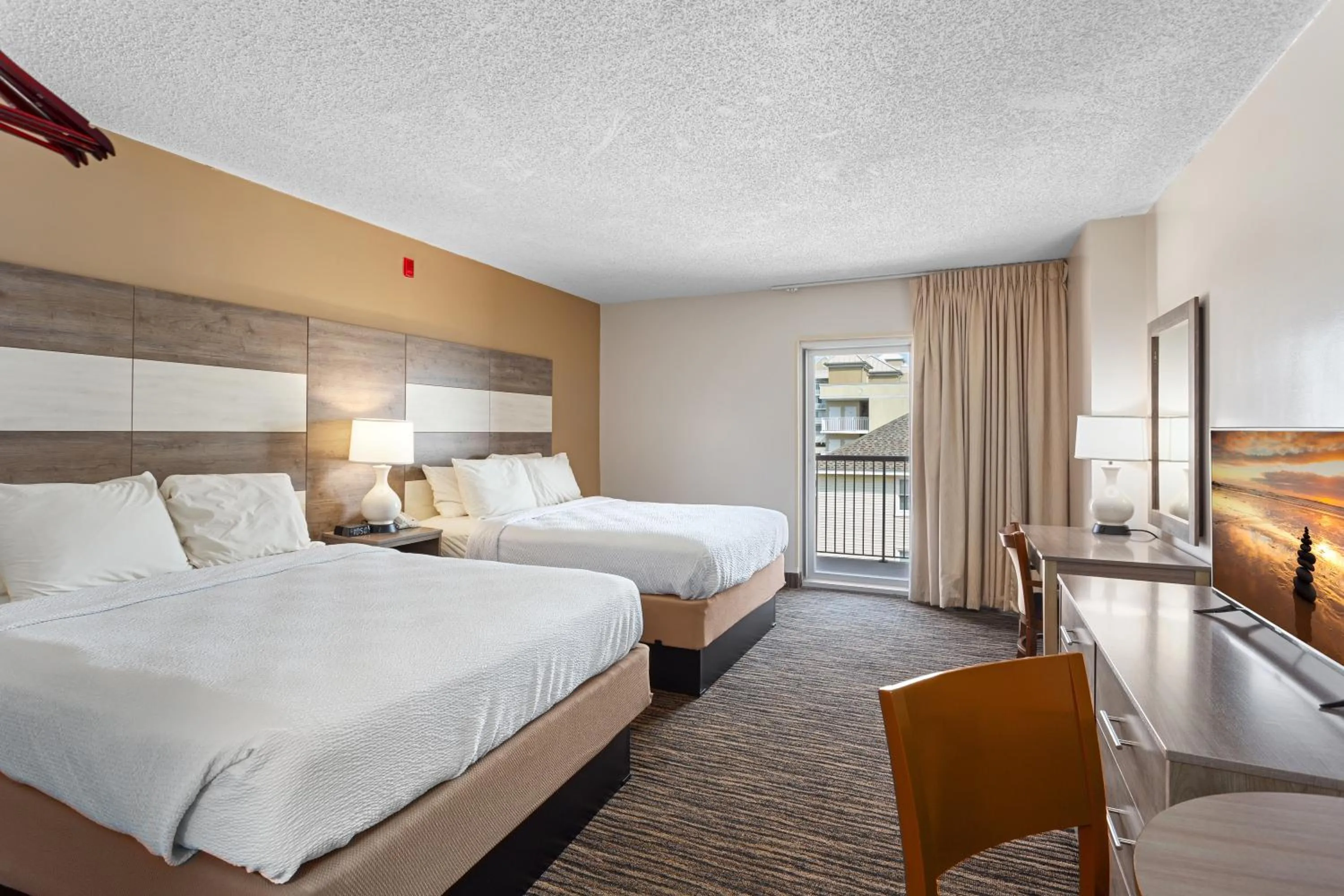 Bed in Americana Motor Inn on Boardwalk