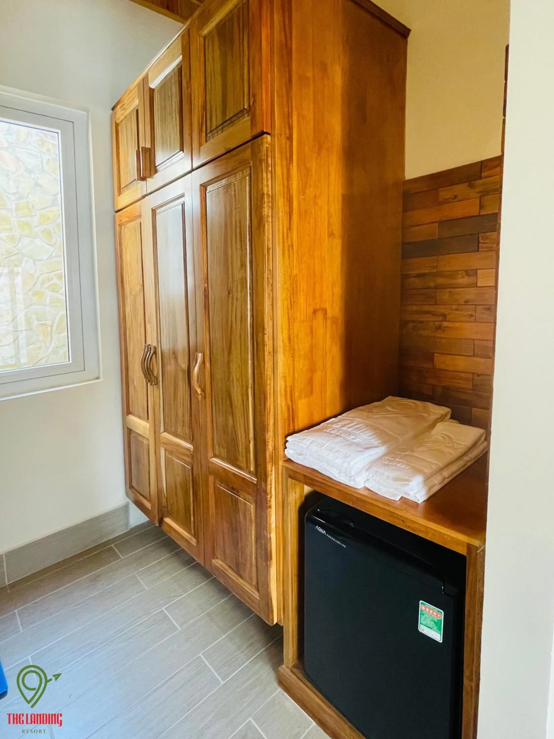 towels, Bed in The Landing Resort