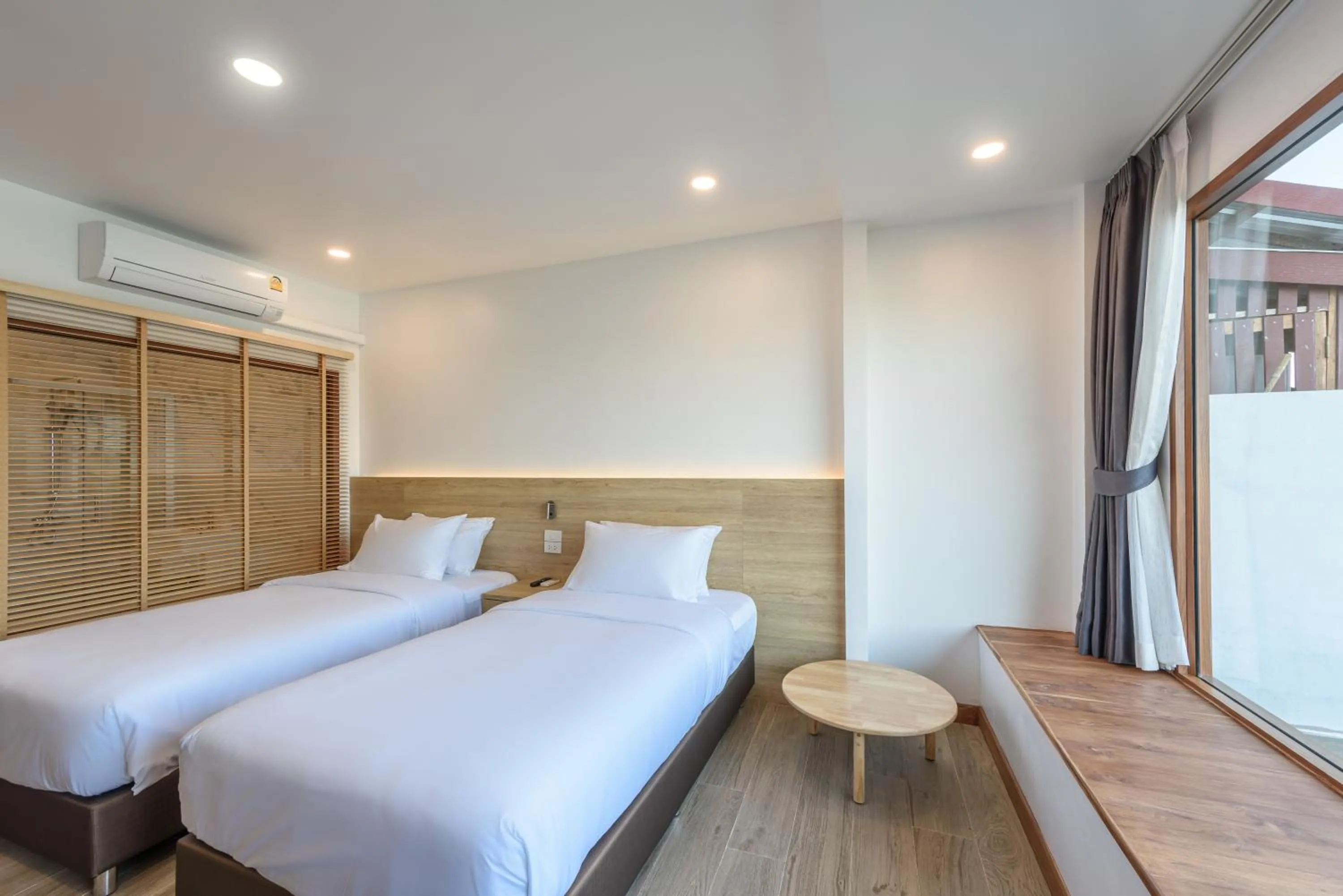 Bed in Chiangkhan River Walk Hotel