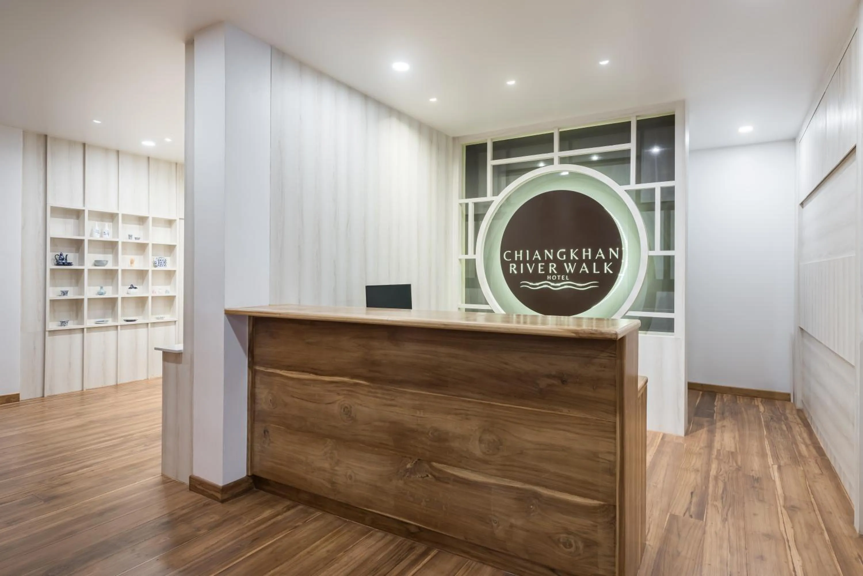 Property logo or sign in Chiangkhan River Walk Hotel