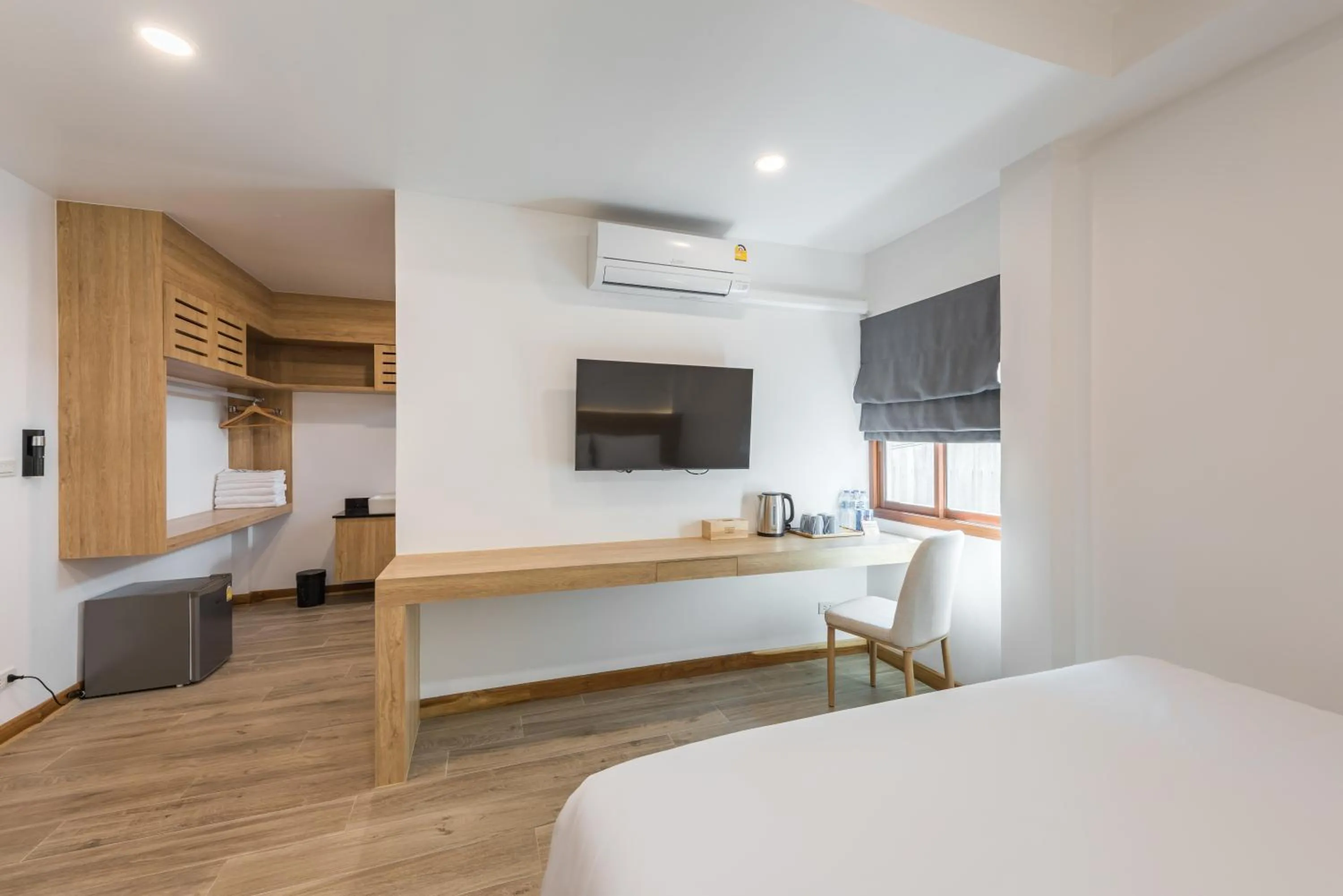 Photo of the whole room, Bed in Chiangkhan River Walk Hotel