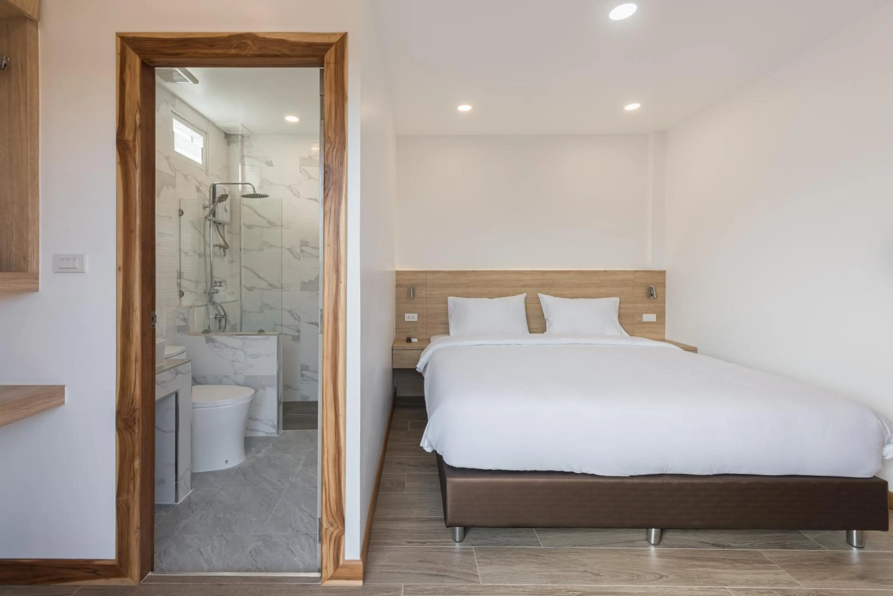 Bed in Chiangkhan River Walk Hotel