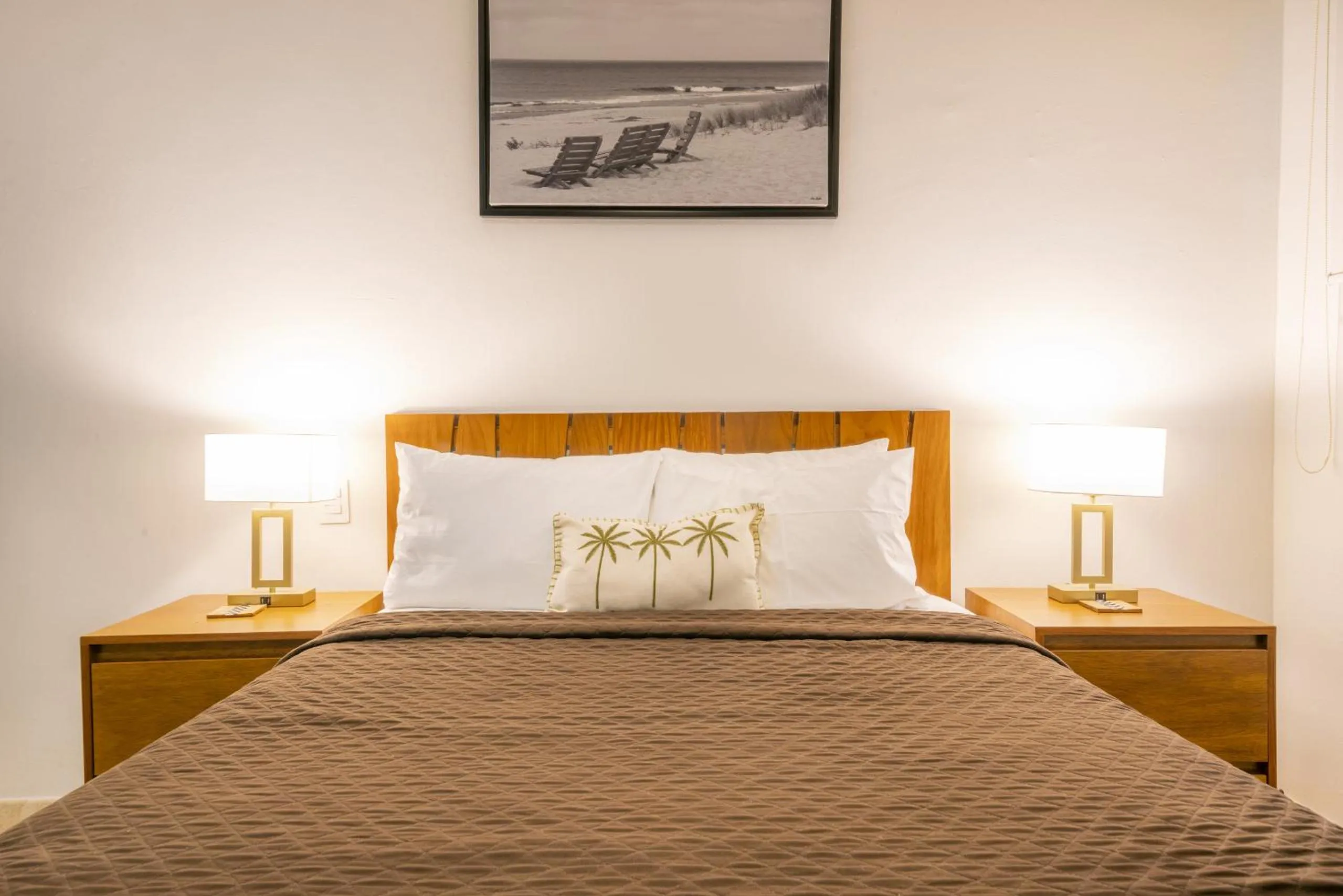 Bed in Condo Surf 405 - Luxury Oceanview Beachfront 3 BR with Gym - At El Faro Condos