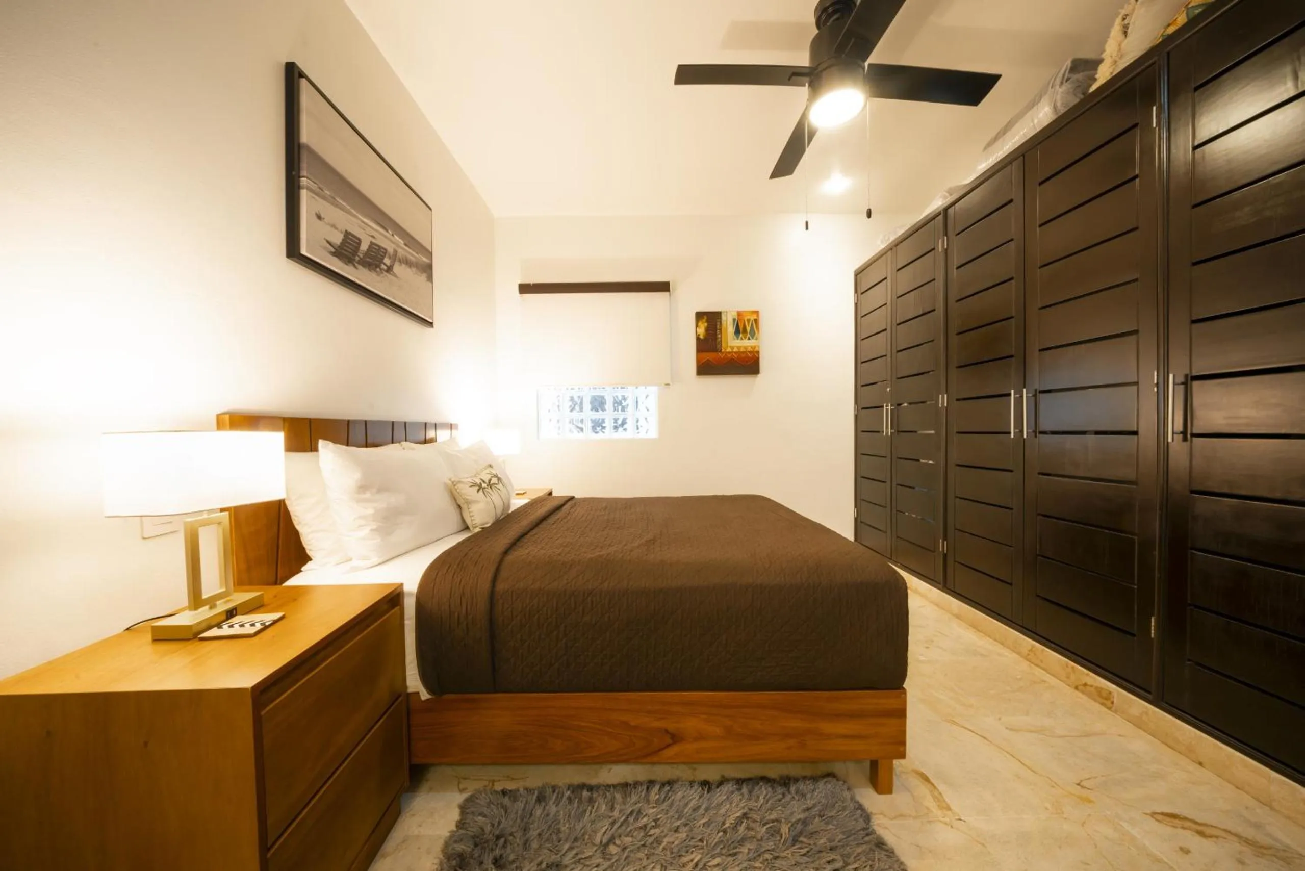 Bed in Condo Surf 405 - Luxury Oceanview Beachfront 3 BR with Gym - At El Faro Condos