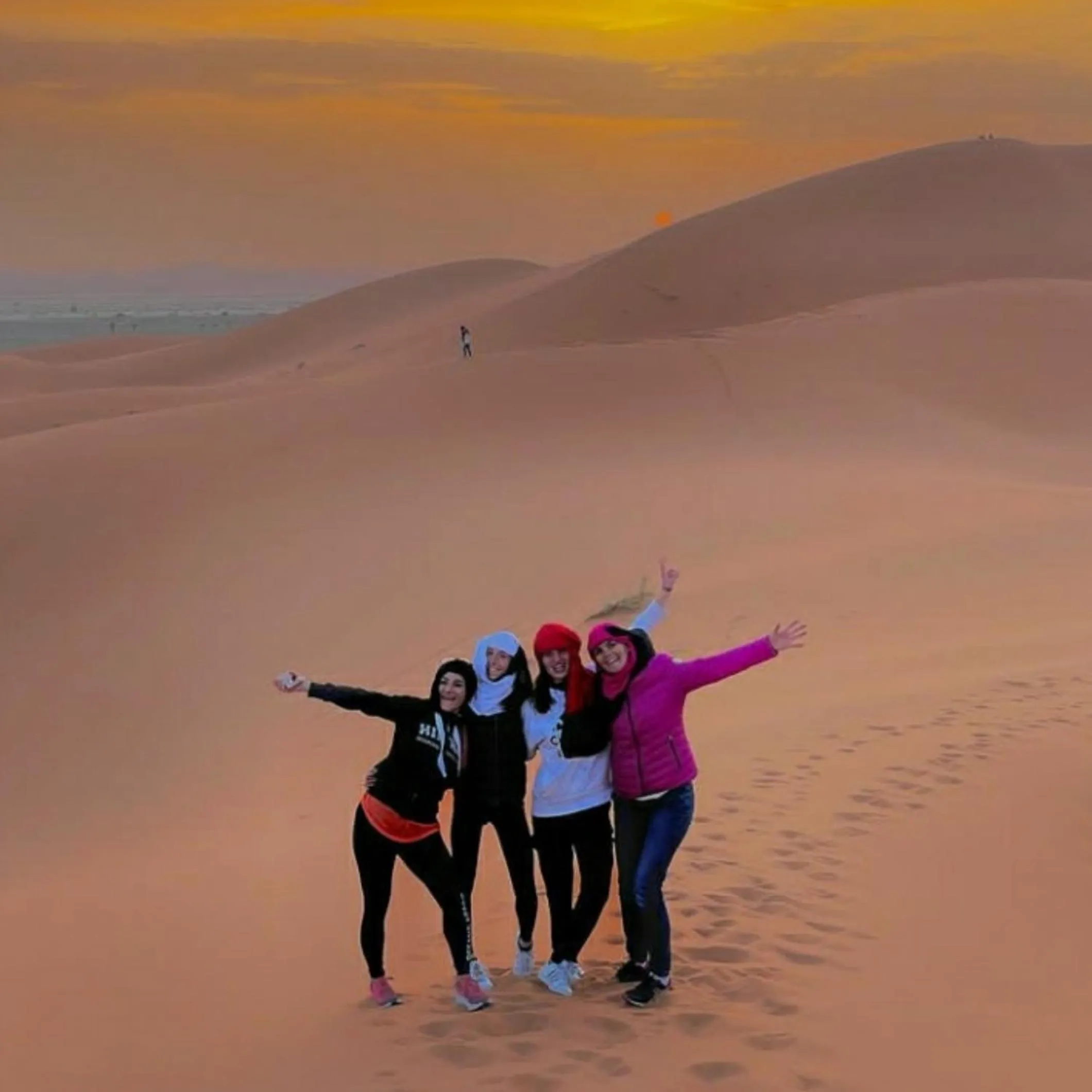 People in Desert Romantic Camp