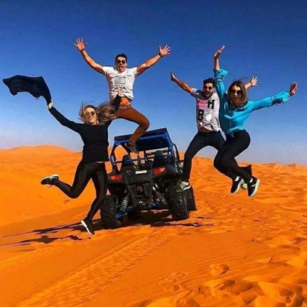 People in Desert Romantic Camp