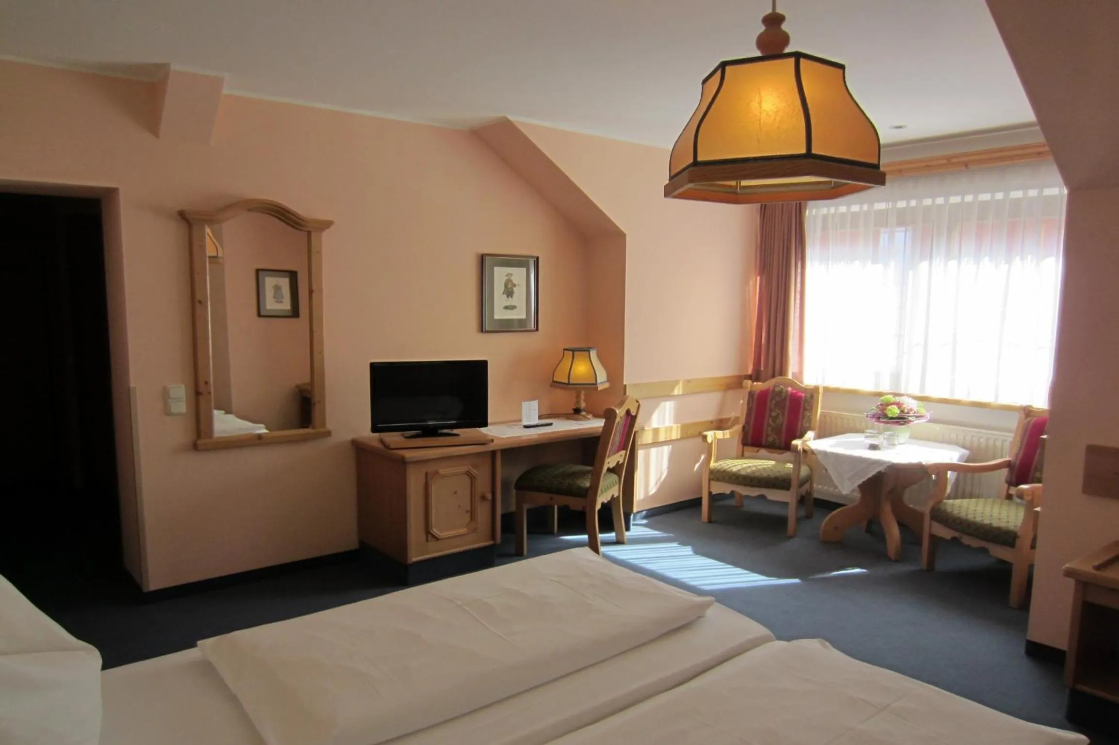 Photo of the whole room, Bed in Hotel Plainbrücke | self check-in