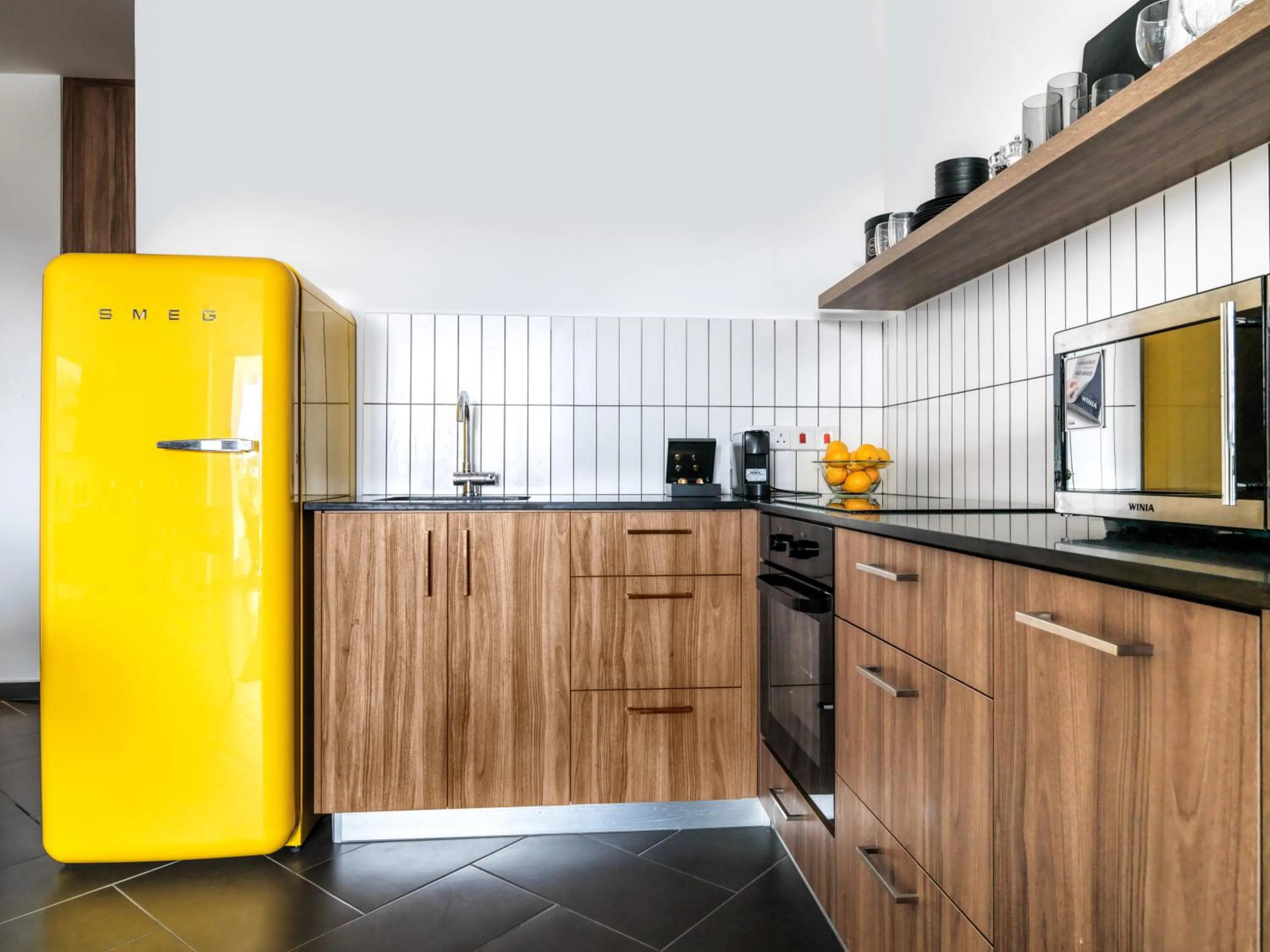 Kitchen or kitchenette in LIV URBAN Suites