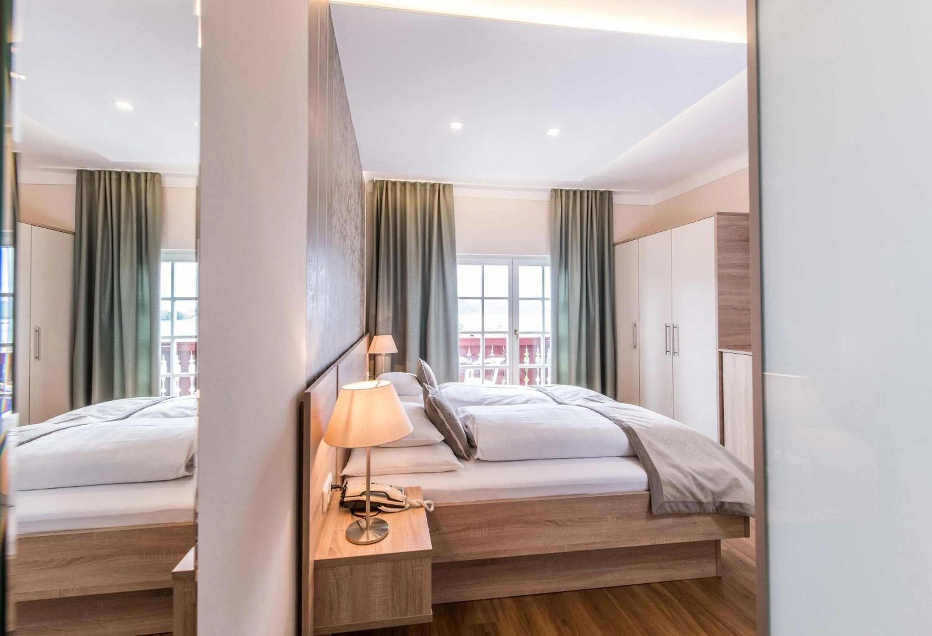 Photo of the whole room, Bed in Lust und Laune Hotel am Wörthersee