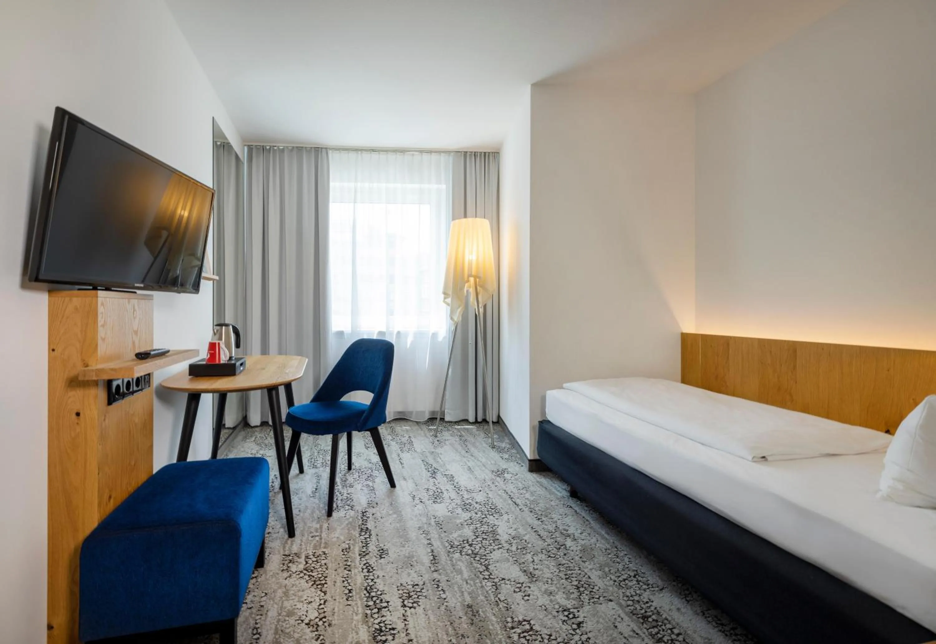 Photo of the whole room, Bed in ARCOTEL Wimberger Wien