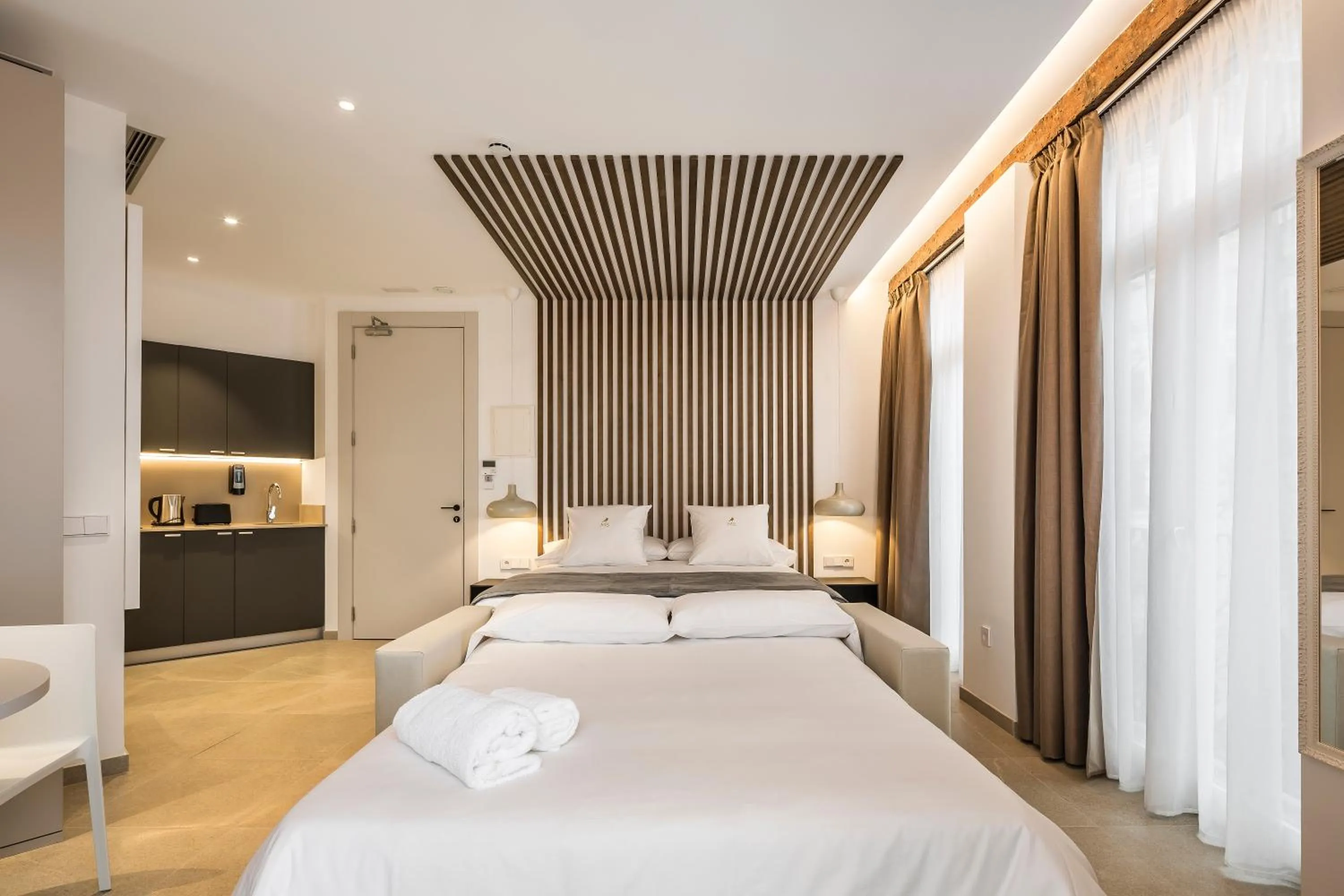 Photo of the whole room, Bed in Mon Suites Benlliure