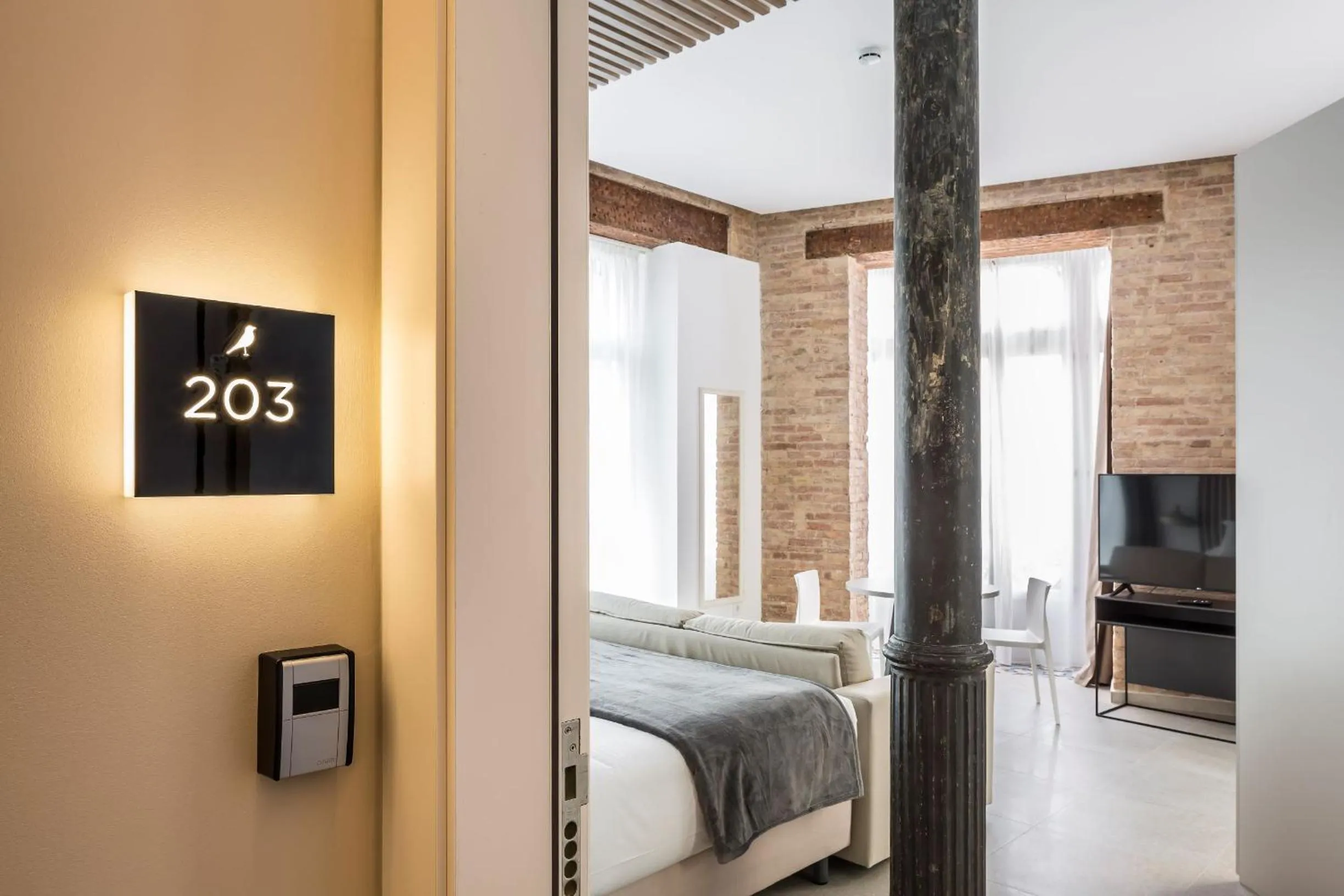 Decorative detail, Bed in Mon Suites Benlliure