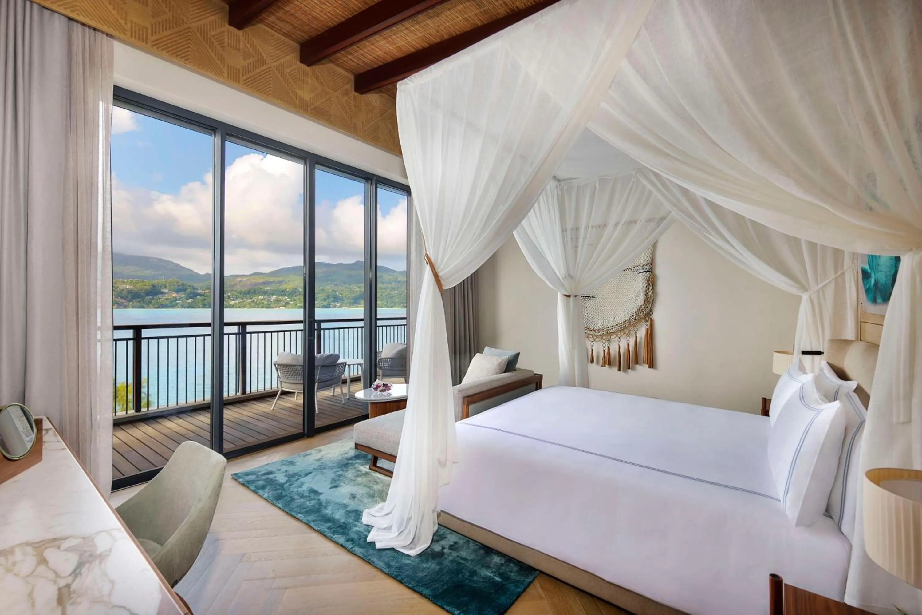 Bed in Mango House Seychelles, LXR Hotels & Resorts