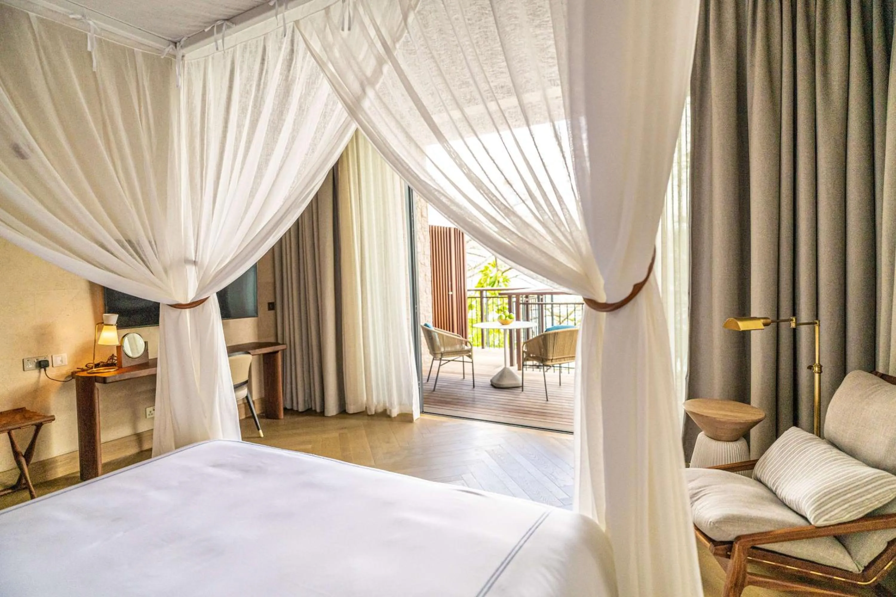 Bed in Mango House Seychelles, LXR Hotels & Resorts