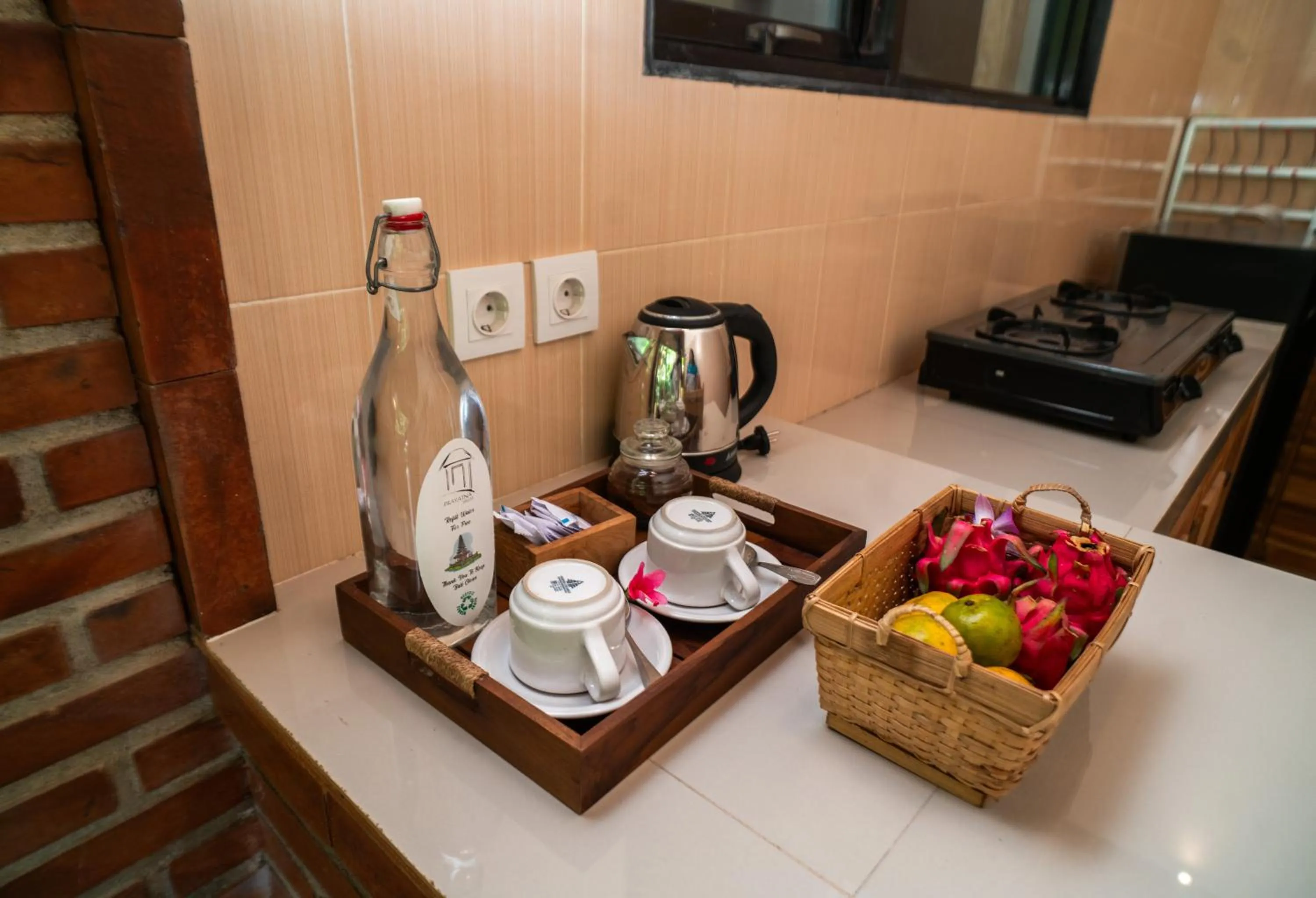 Kitchen or kitchenette in Prayatna Villas
