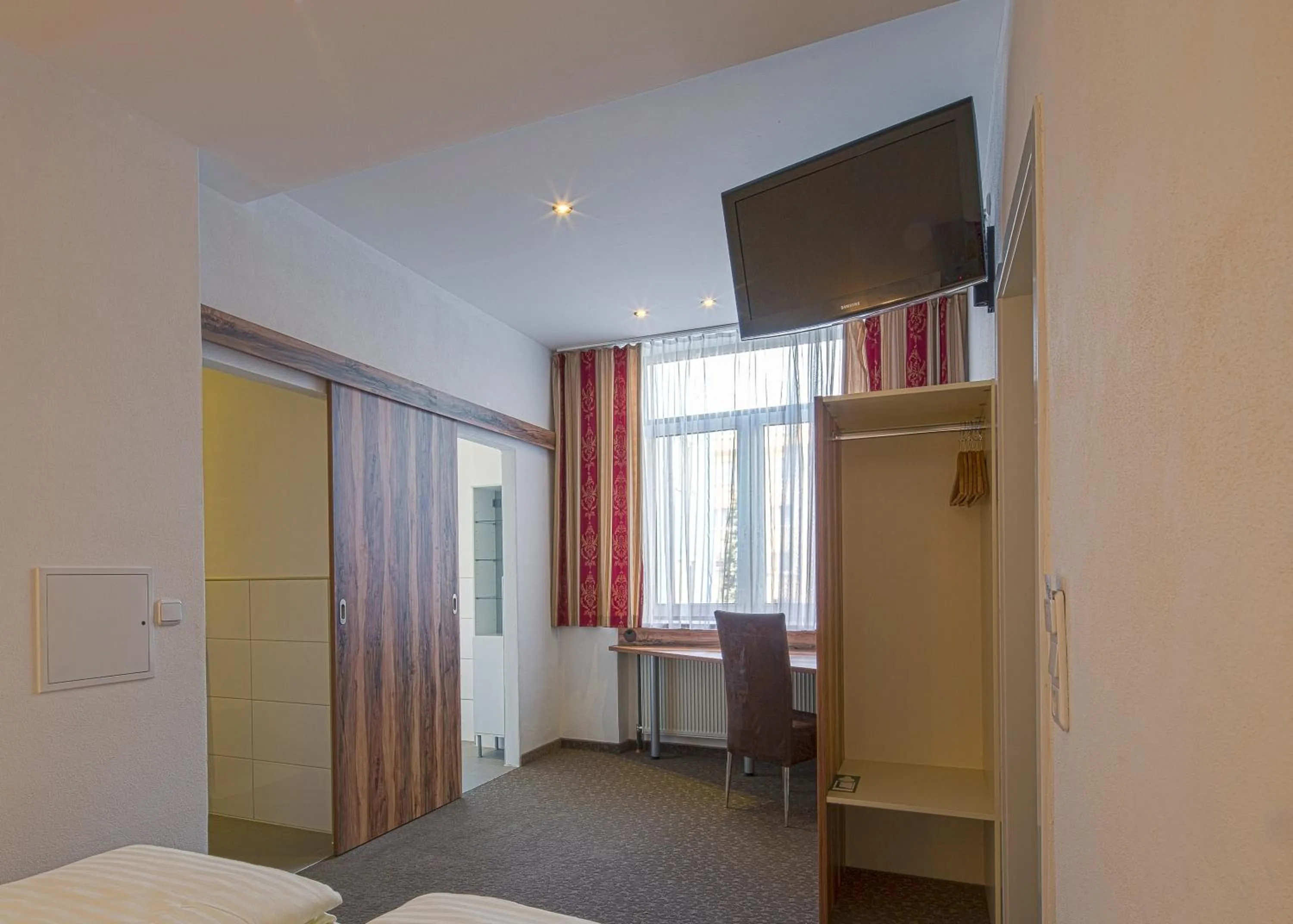 Photo of the whole room, Bed in Hotel Bayrischer Hof