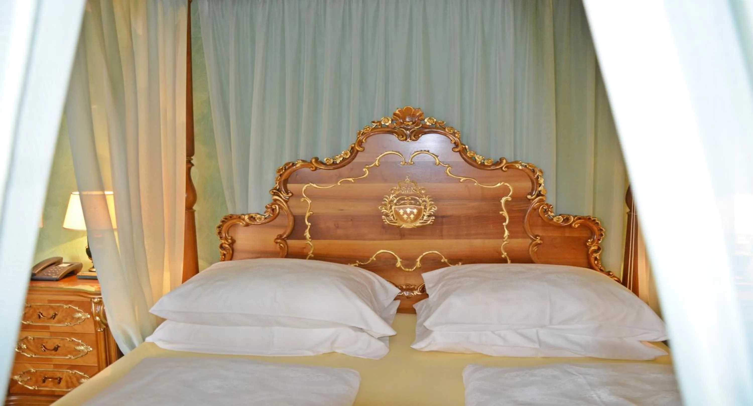 Decorative detail, Bed in Seehotel Porcia