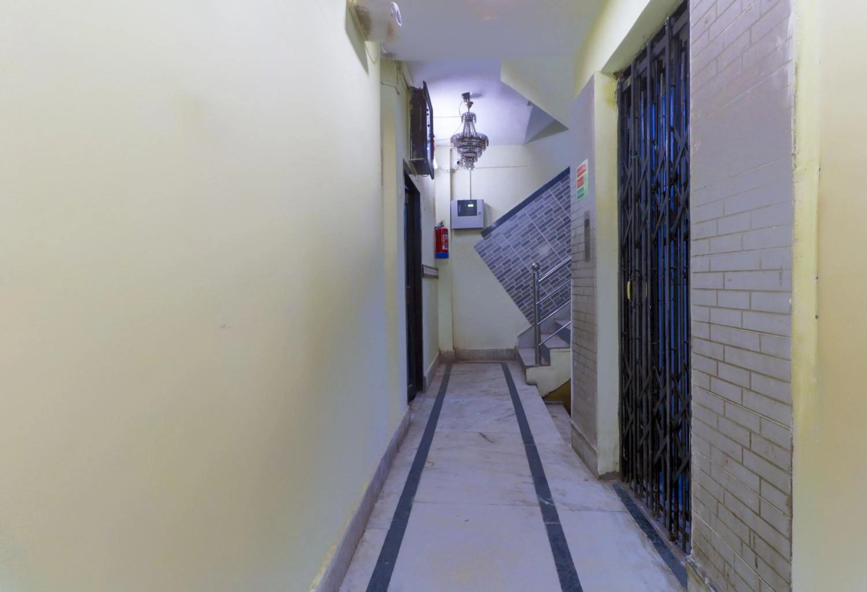 Lobby or reception in Hotel O Home Cozy Studio Collage Square Hotel Maya International Near St. Thomas's Church