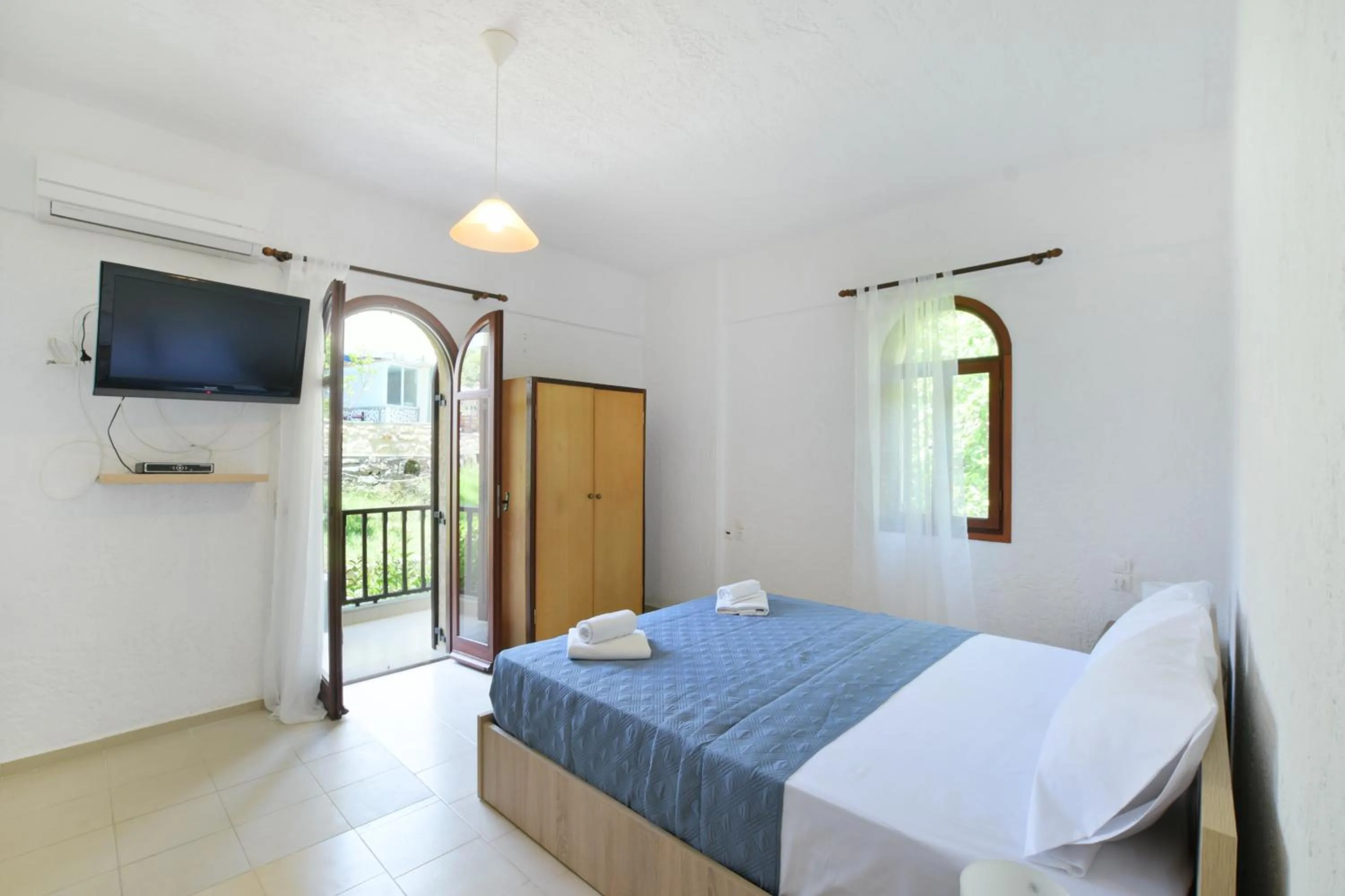 Bed in Galini Apartments