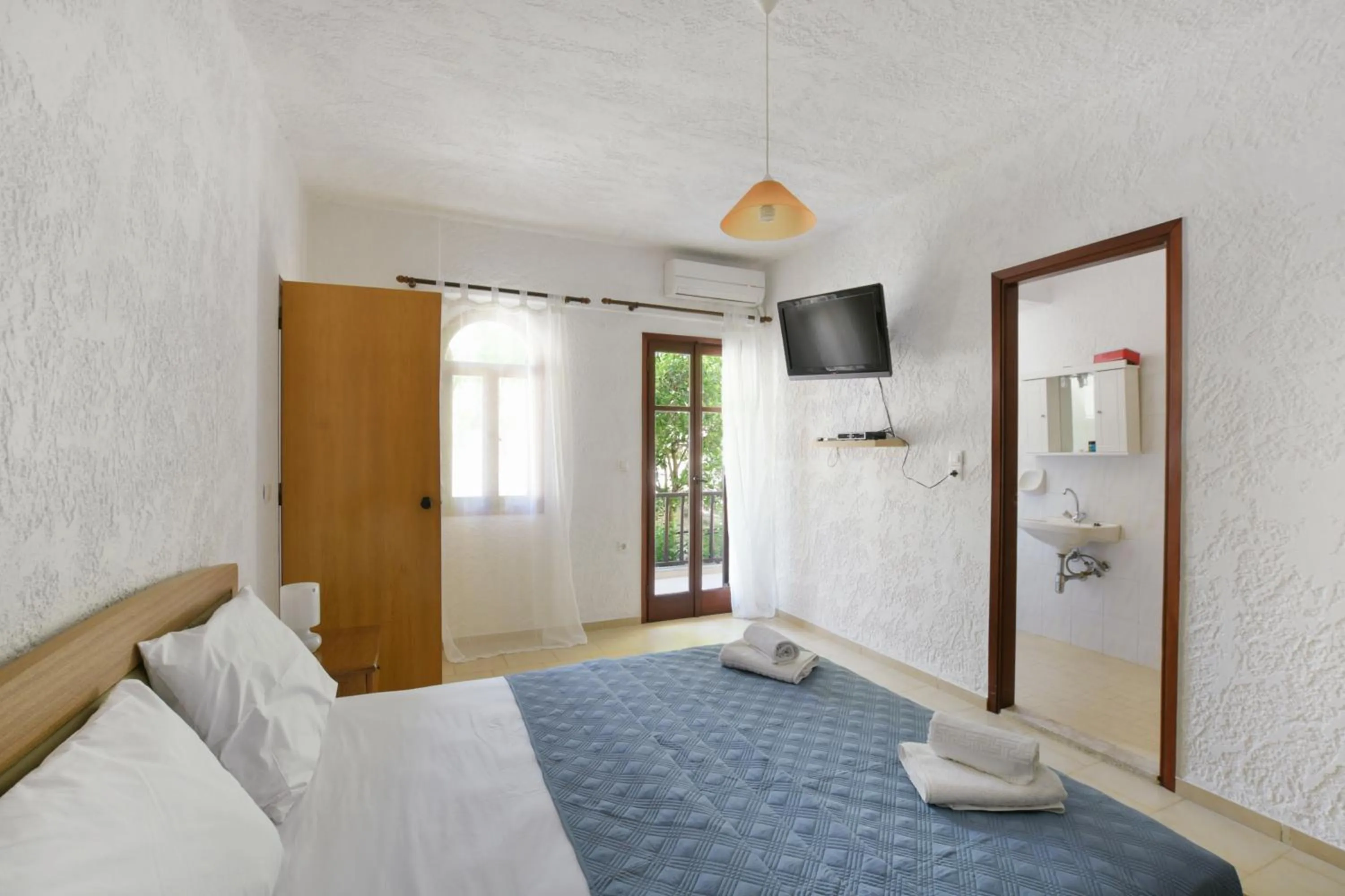 Bed in Galini Apartments