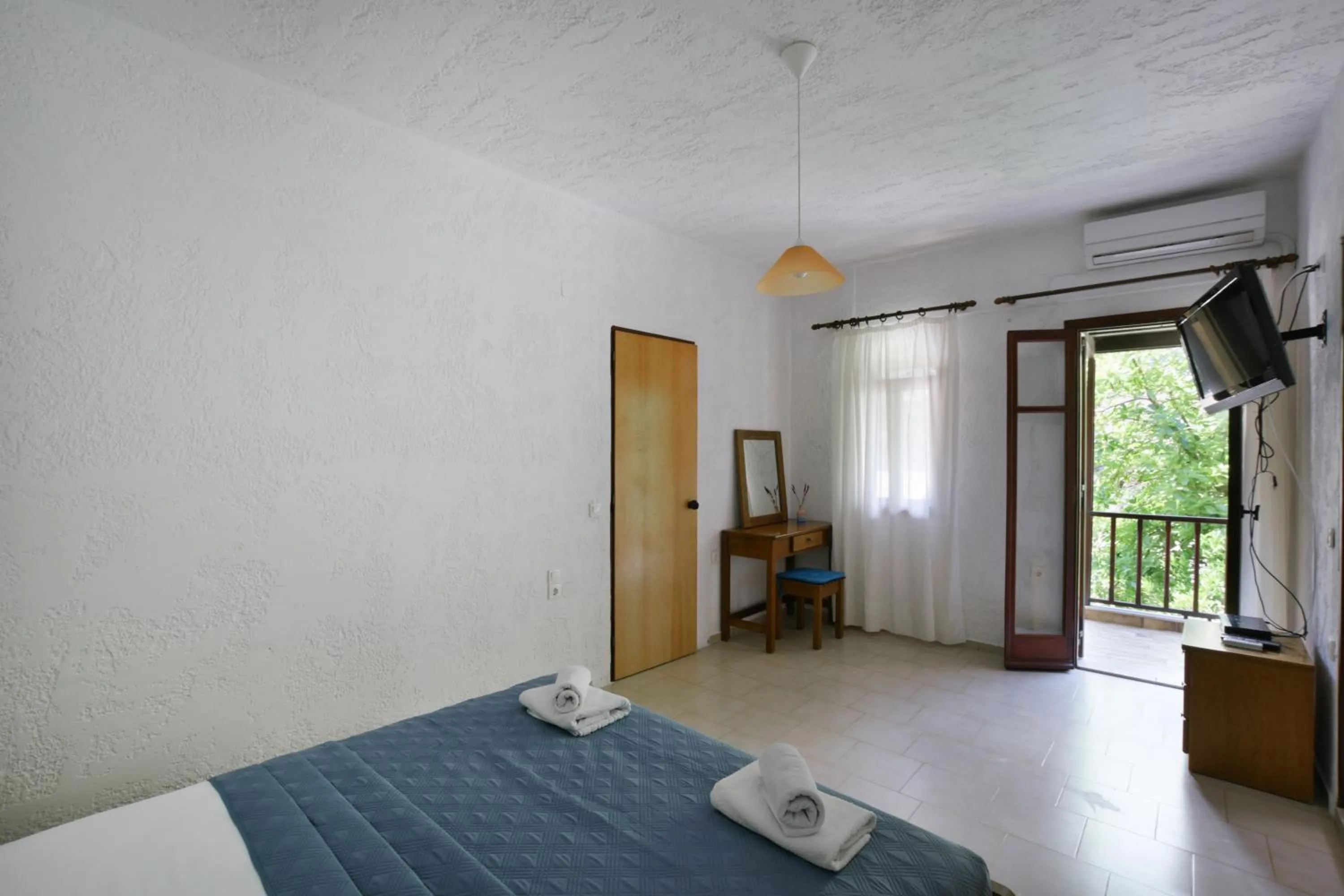 Bed in Galini Apartments