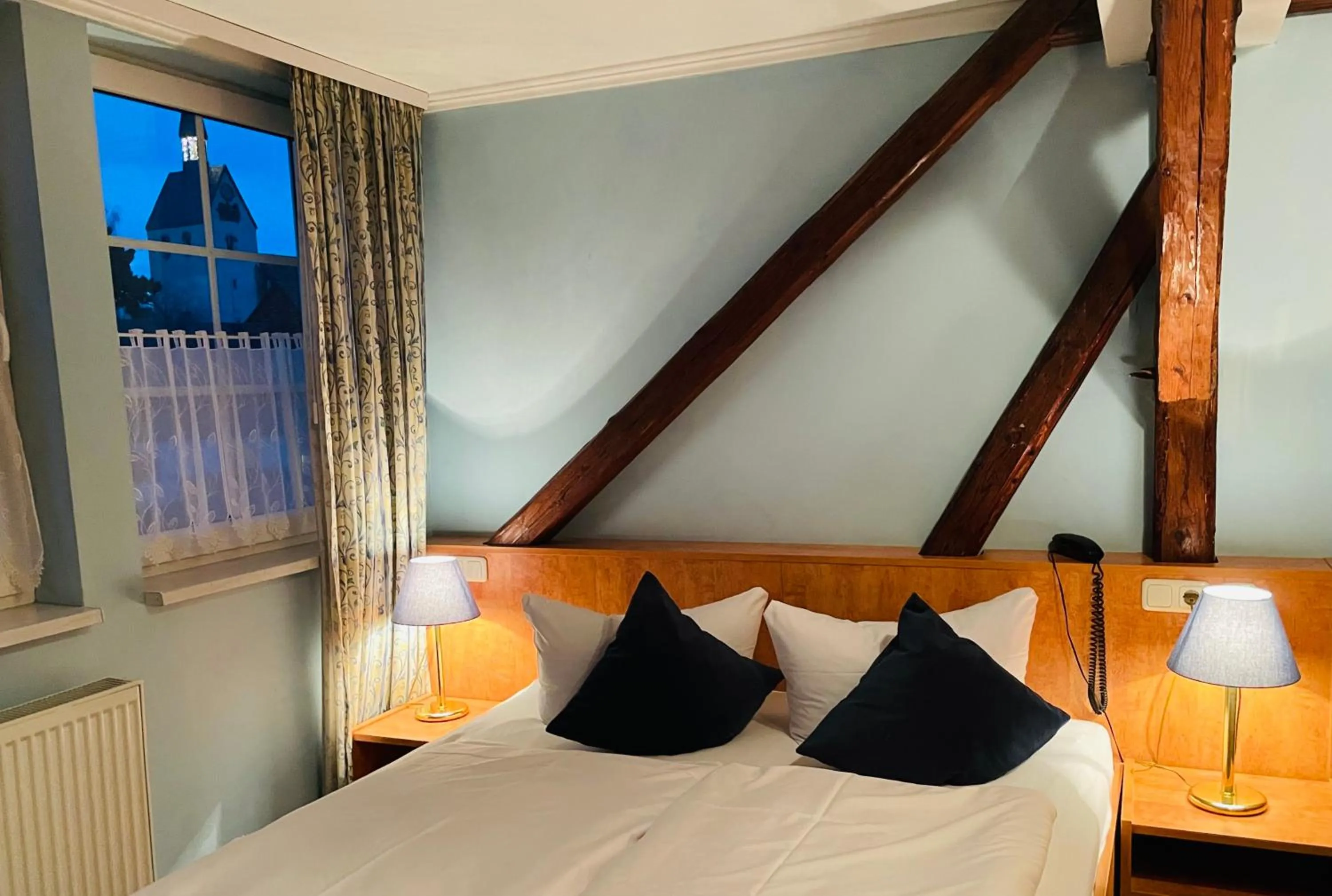 Photo of the whole room, Bed in Harzhotel Warnstedter Krug