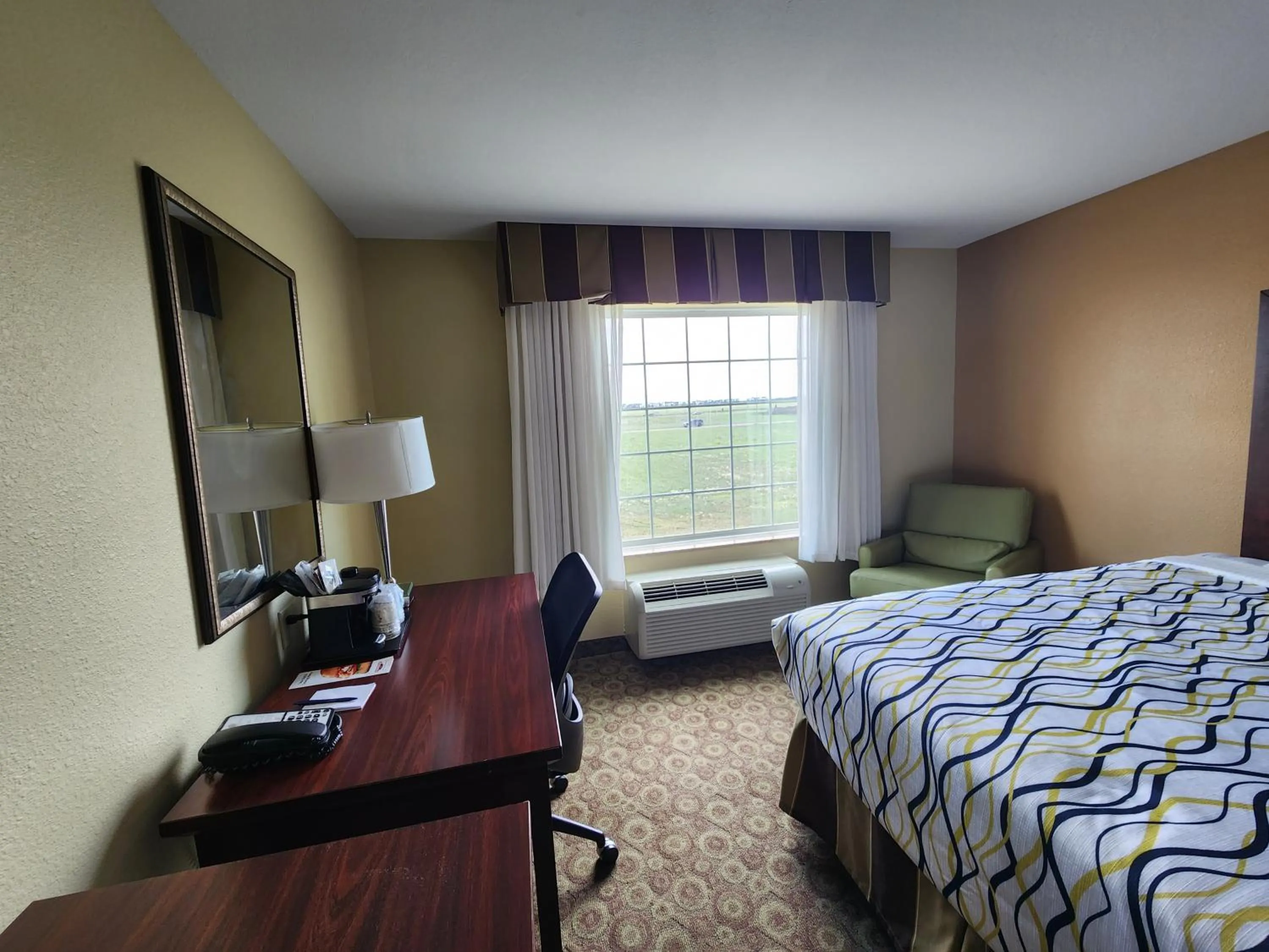 Bed in Highland Suites Minot