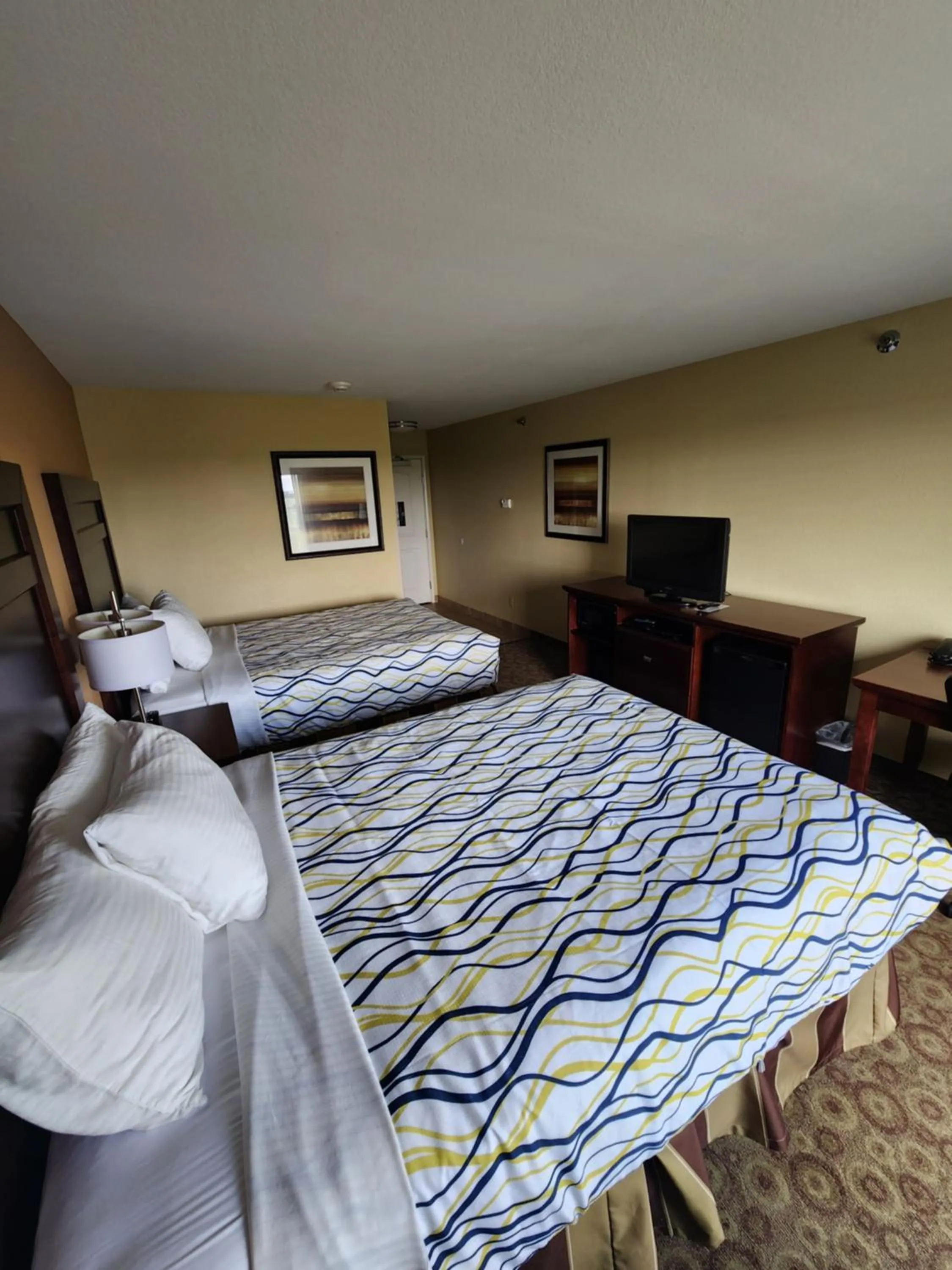 Bed in Highland Suites Minot