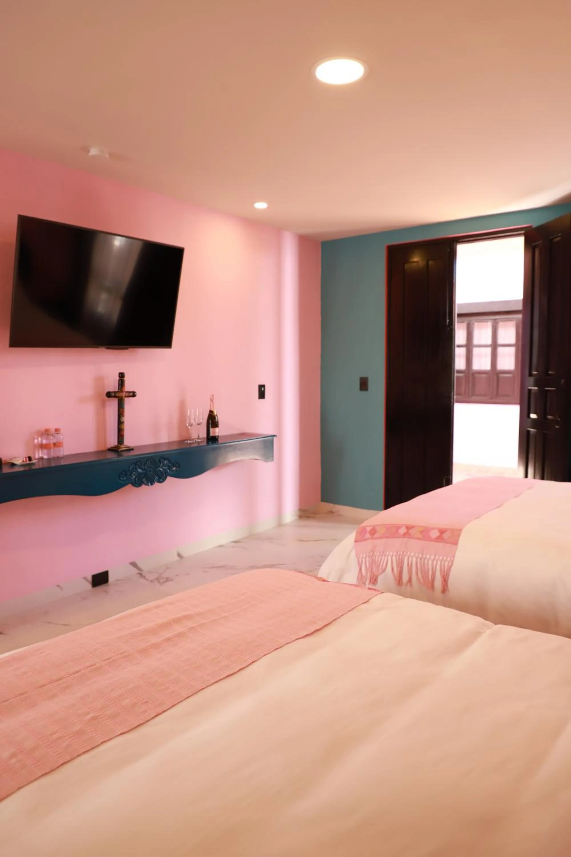 Bed in Casa Rosa Hotel & Spa