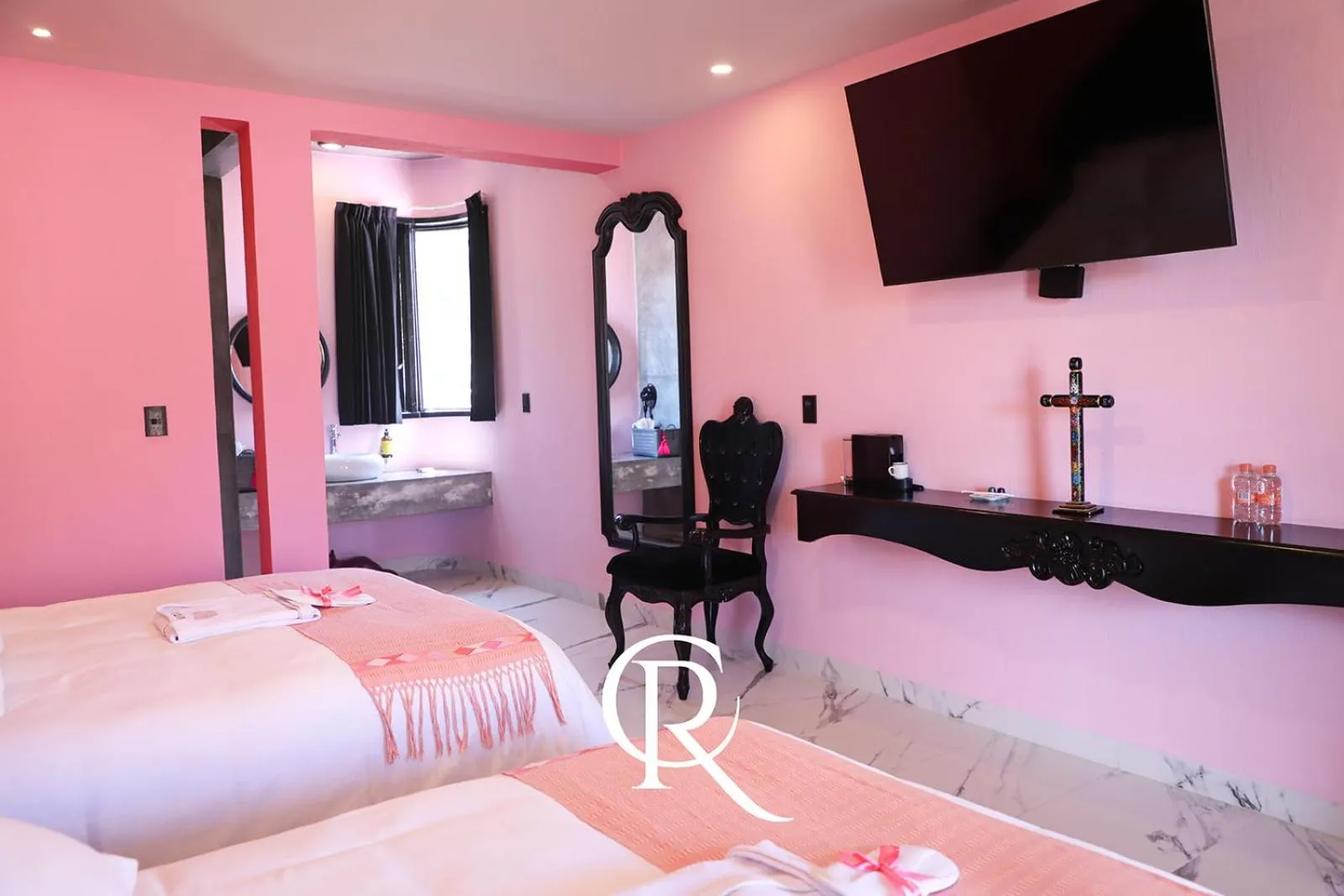 Bed in Casa Rosa Hotel & Spa