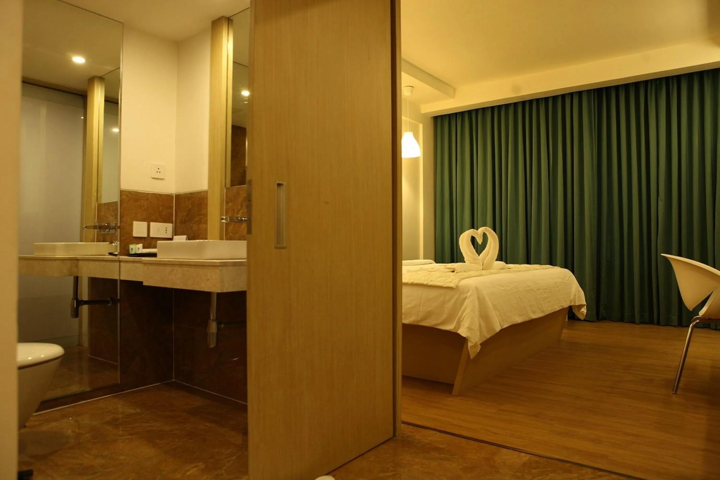 Bed in Ginger Kochi MG Road