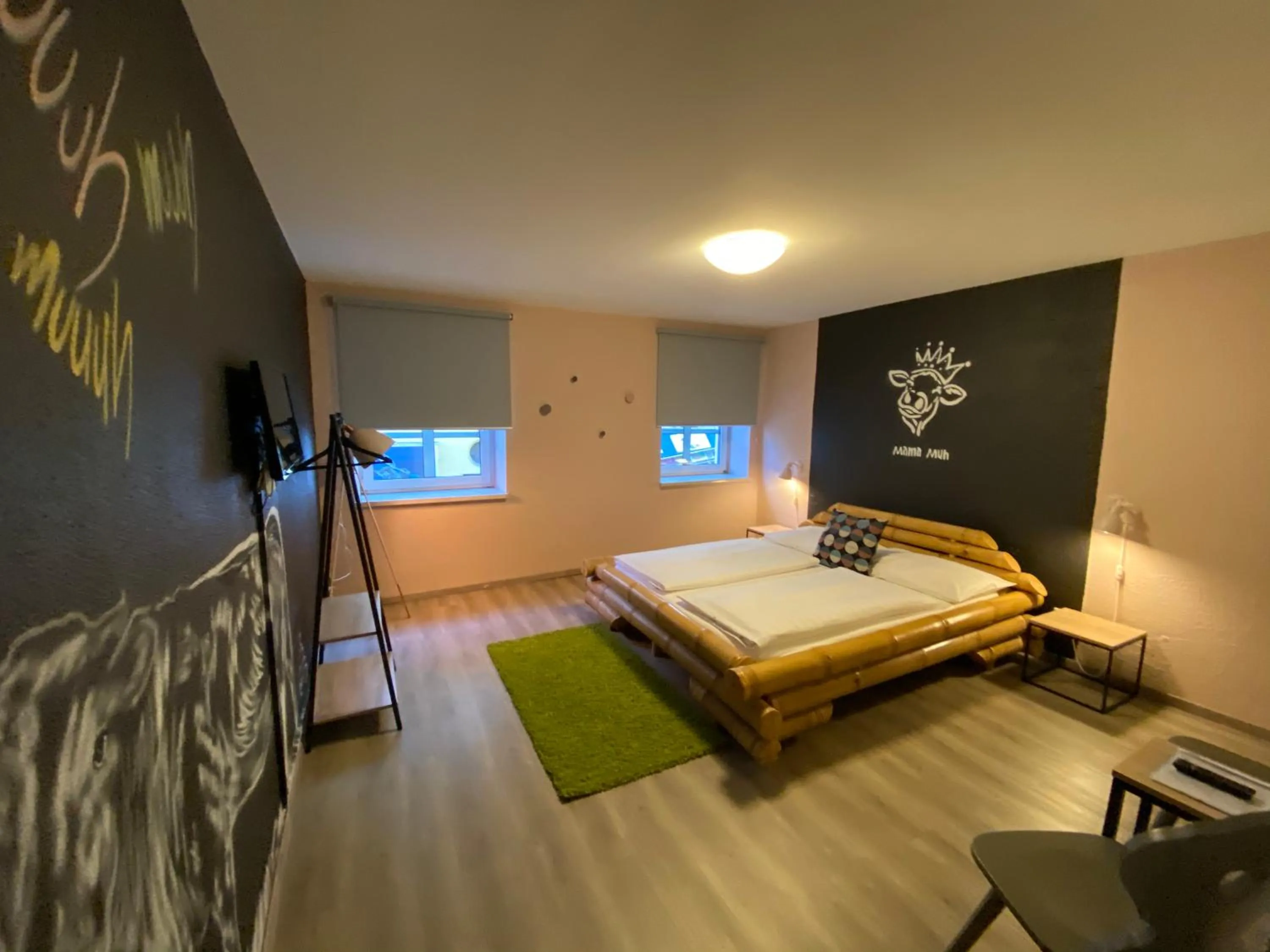 Photo of the whole room, Bed in Mama Muh Self-Check-in