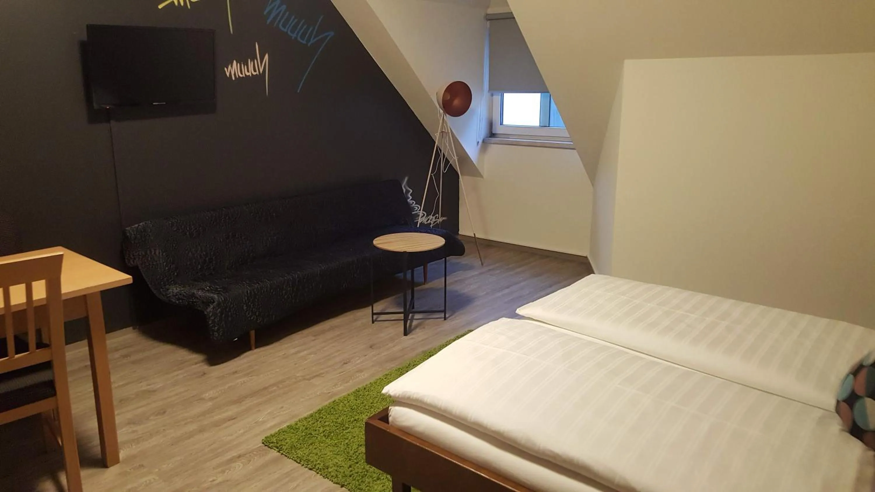 Photo of the whole room, Bed in Mama Muh Self-Check-in