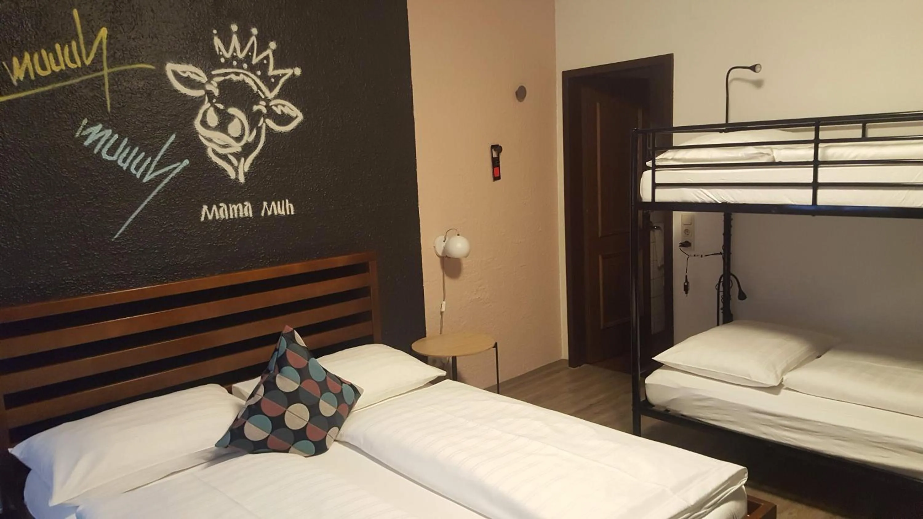 Photo of the whole room, Bed in Mama Muh Self-Check-in