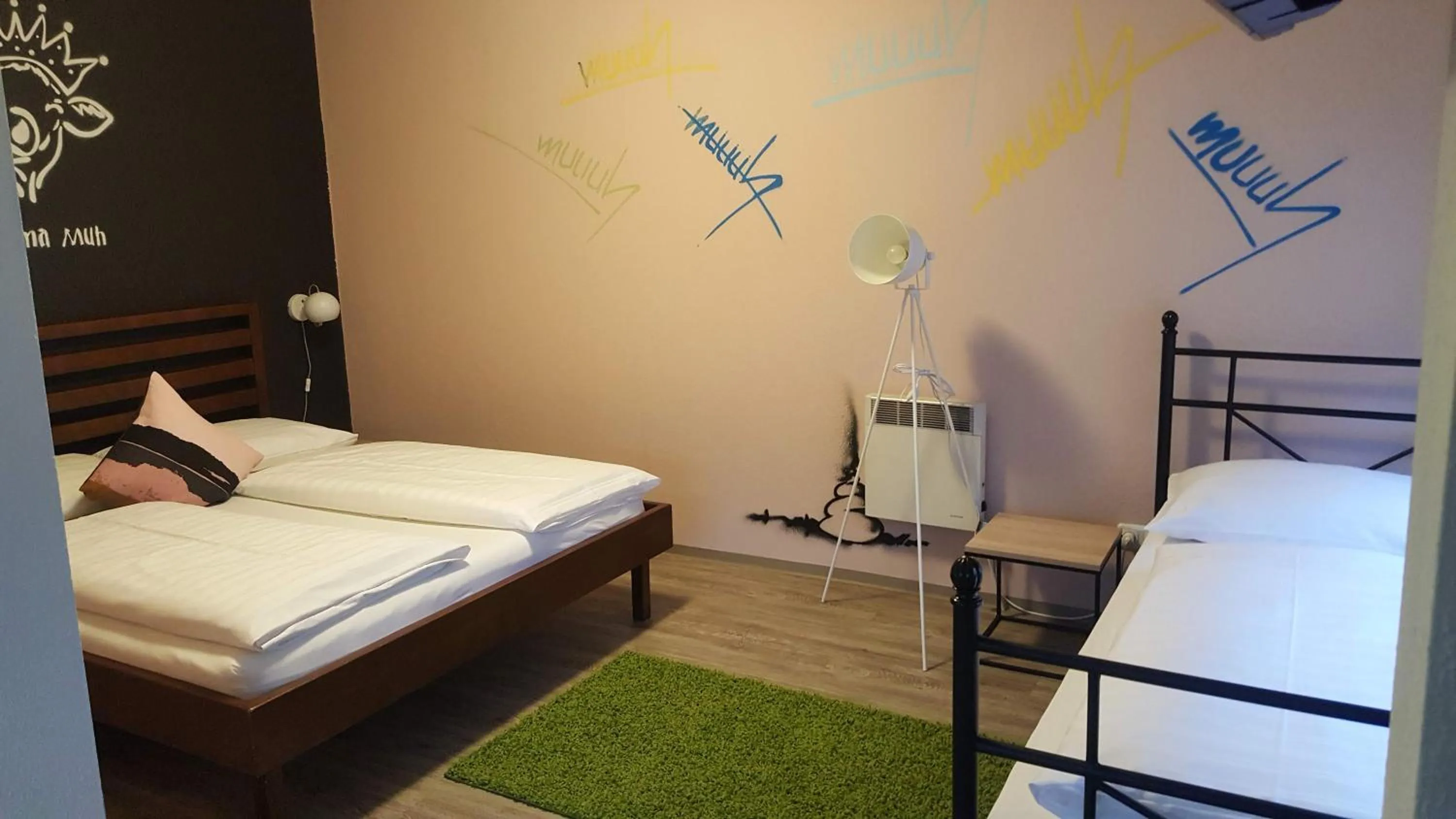 Photo of the whole room, Bed in Mama Muh Self-Check-in