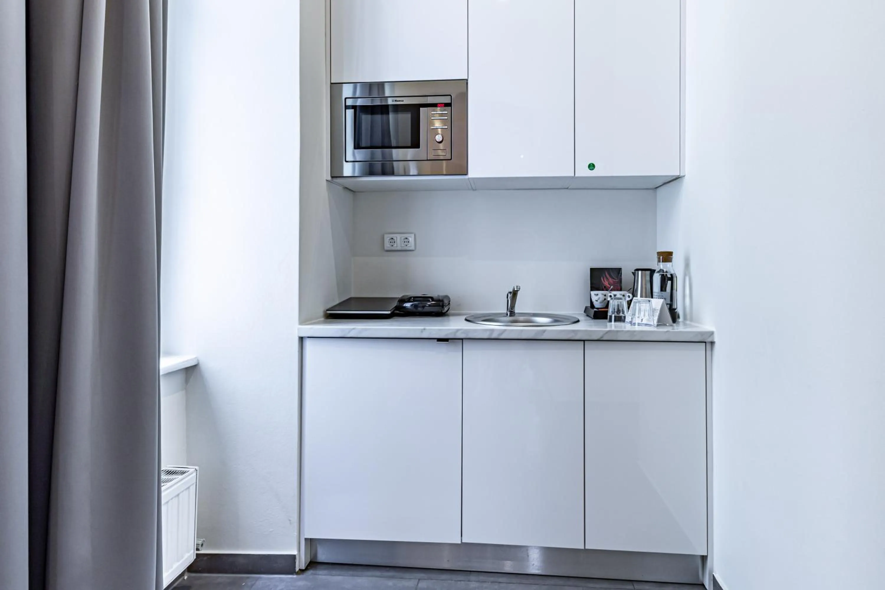 Kitchen or kitchenette in The Levante Rathaus Apartments