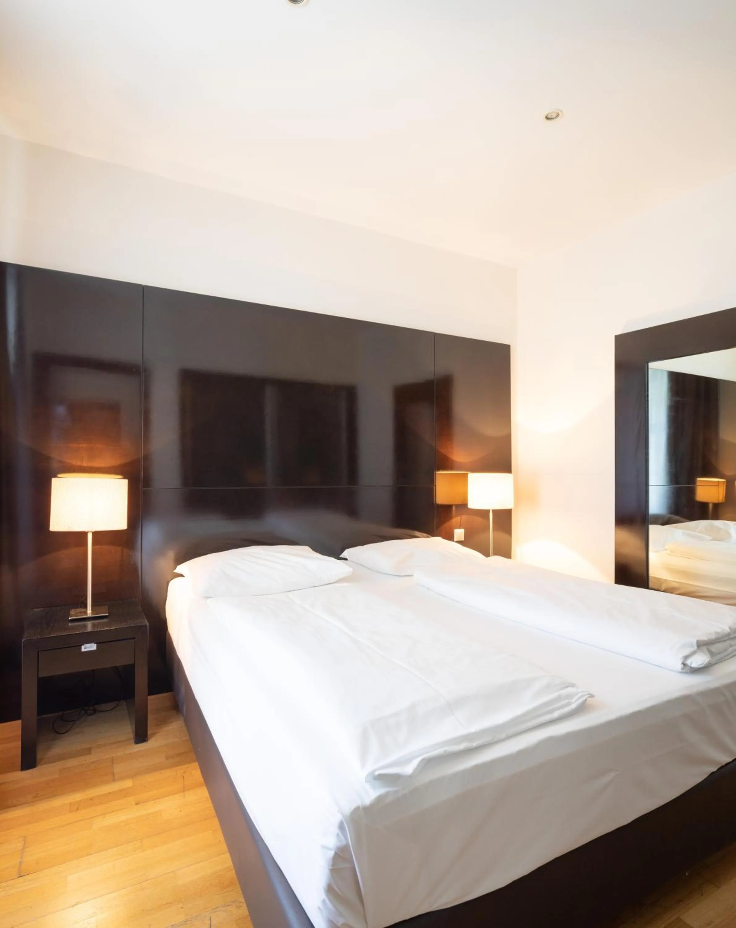 Bedroom, Bed in The Levante Rathaus Apartments