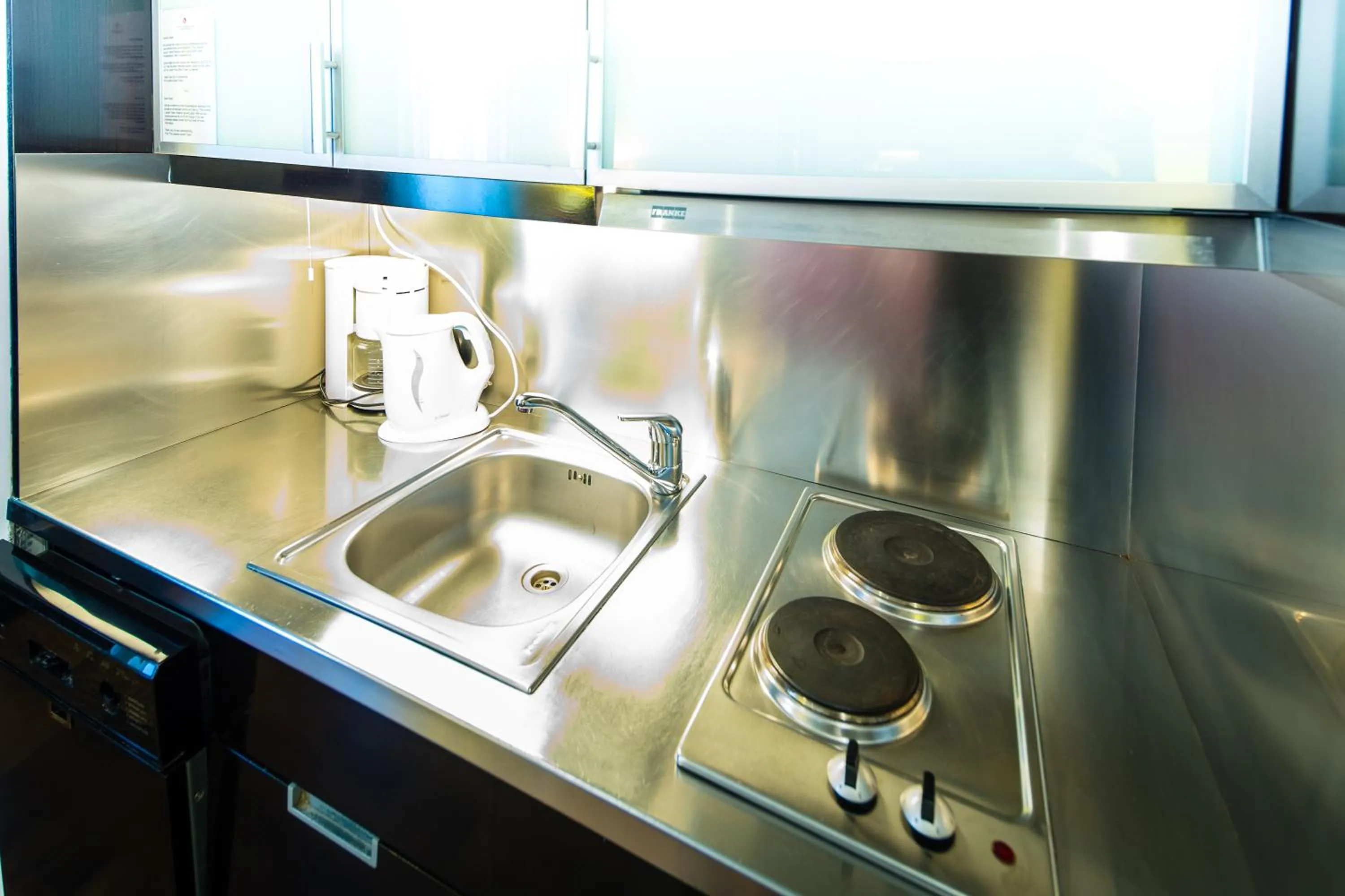 Kitchen or kitchenette in The Levante Rathaus Apartments