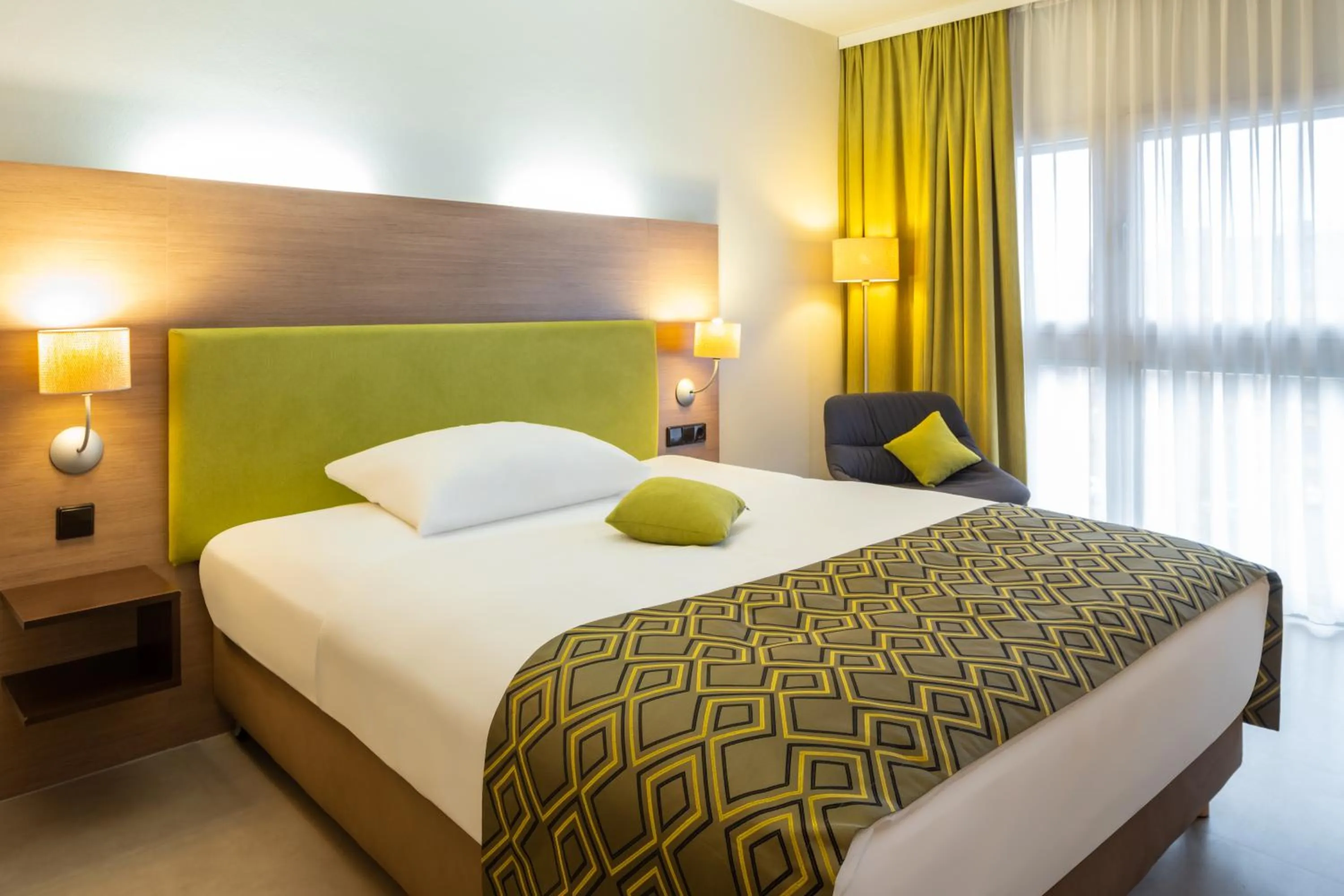 Bed in Hotel Mercure Graz City