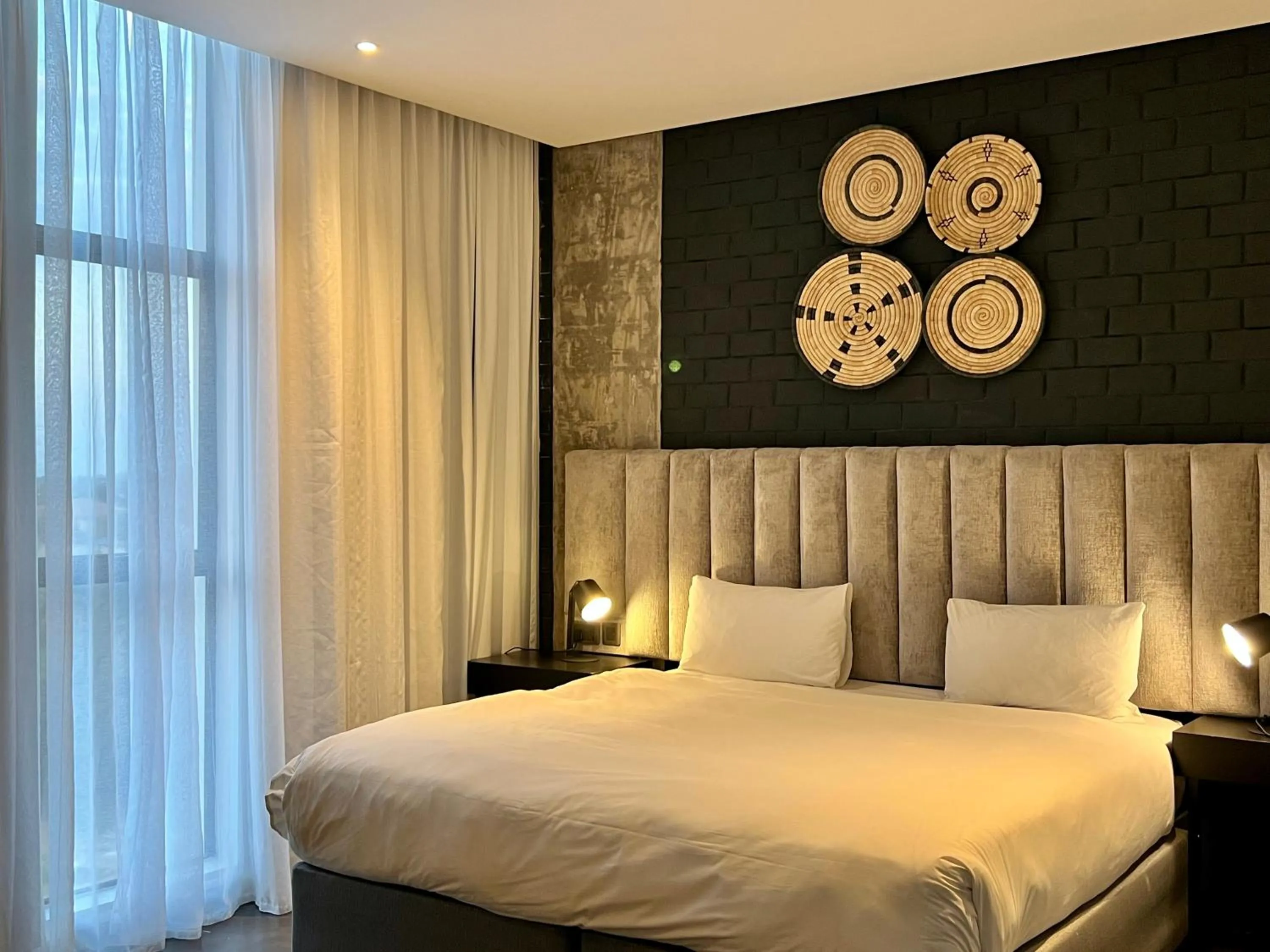 Bed in The Urban Hotel Lusaka