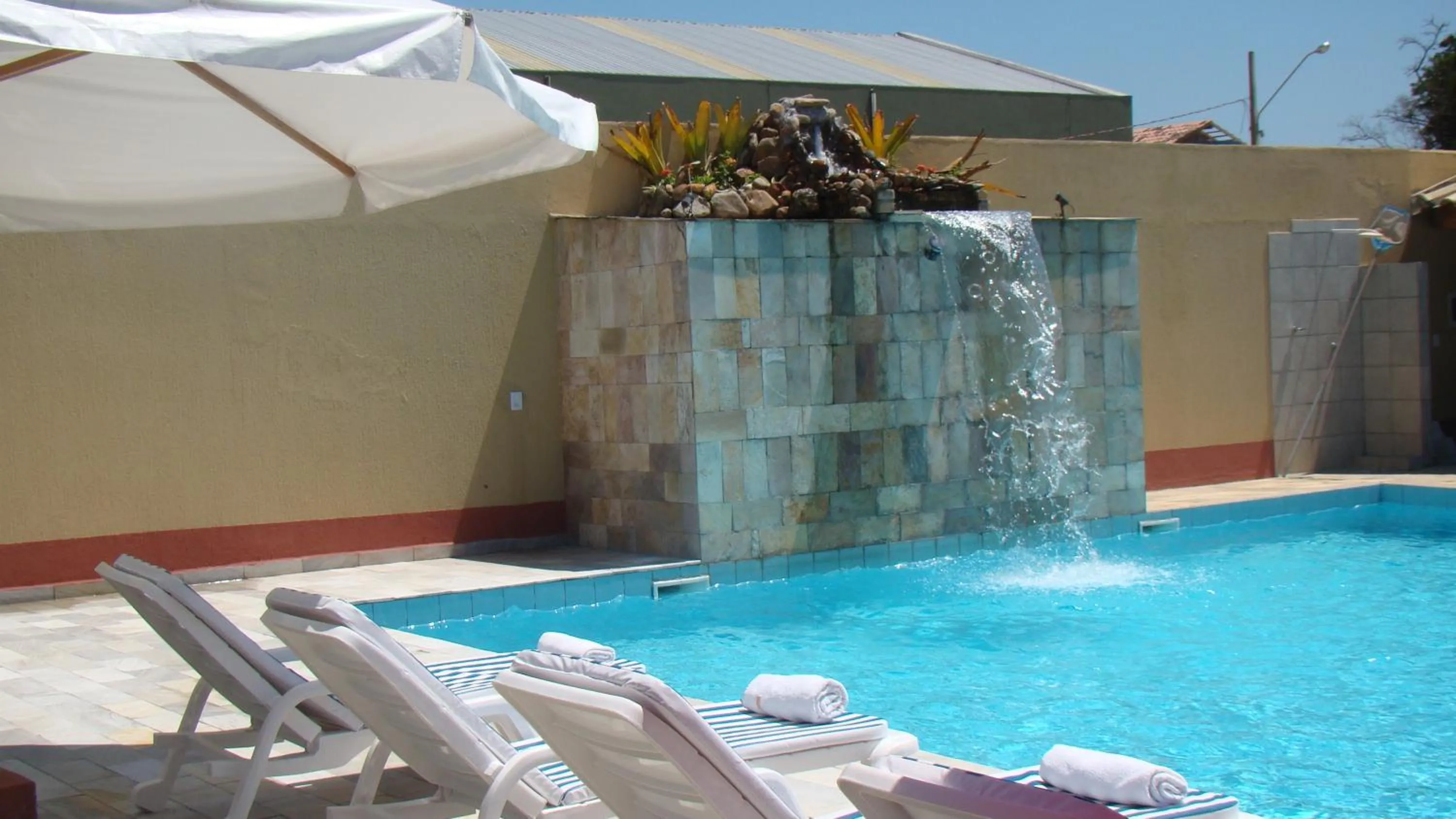 Swimming pool in Pousada Vale Del Sol