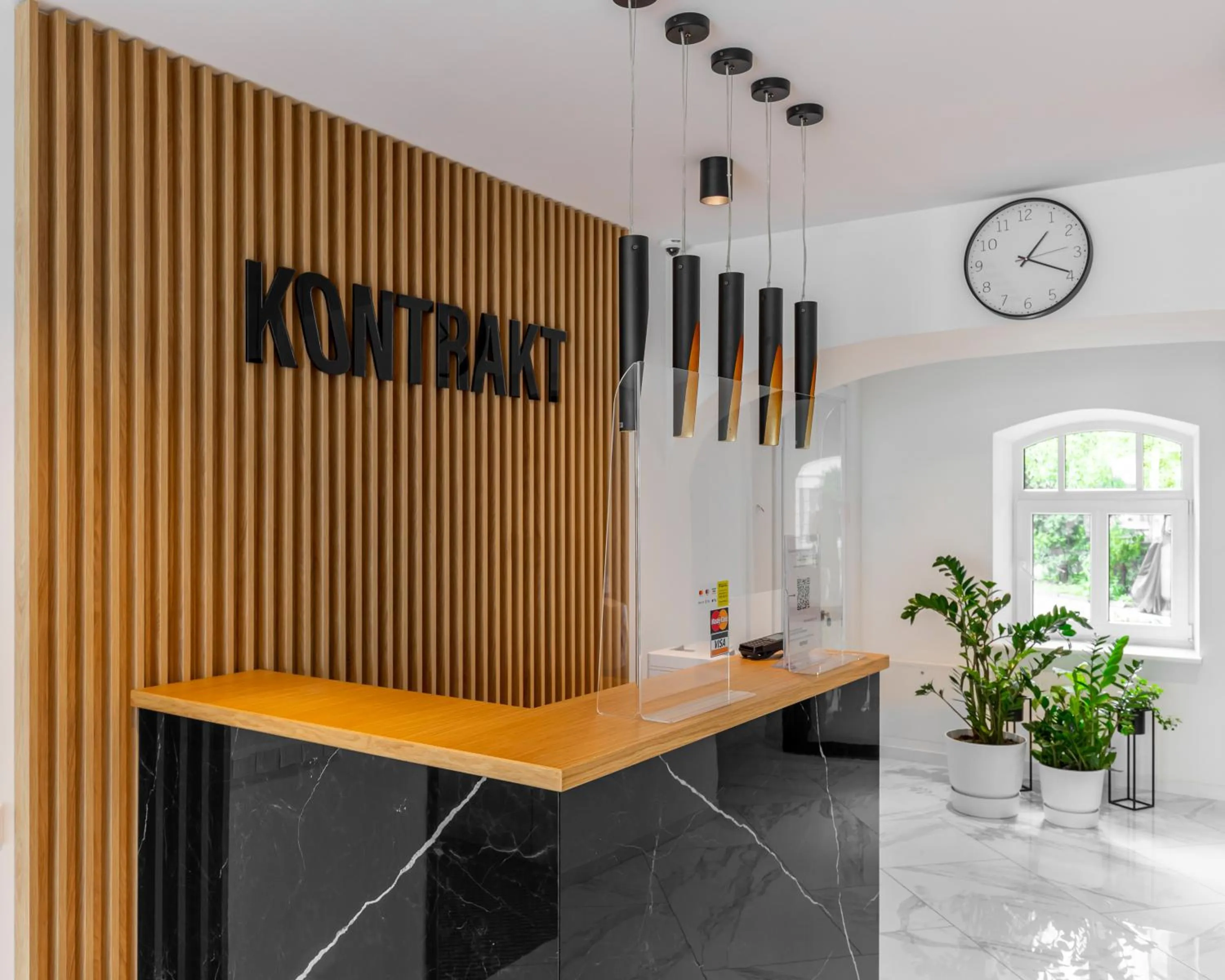 Lobby or reception in KONTRAKT Boutique Hotel