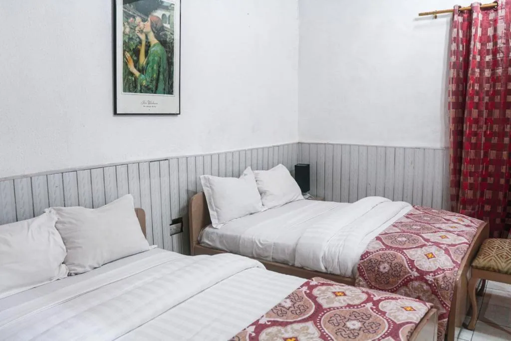 Bed in Hill View Hotel West Airport